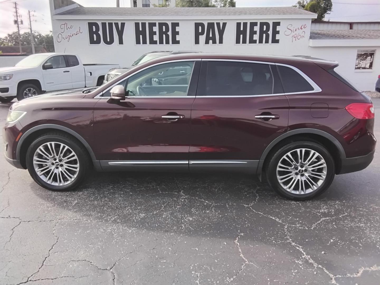 2017 RED LT /Beige Lincoln MKX Reserve (2LMPJ6LR8HB) with an 3.7L V6 DOHC 24V engine, 6A transmission, located at 6112 N Florida Avenue, Tampa, FL, 33604, (888) 521-5131, 27.954929, -82.459534 - 499$ DOWN PLUS TAX & TAG. - Photo#0