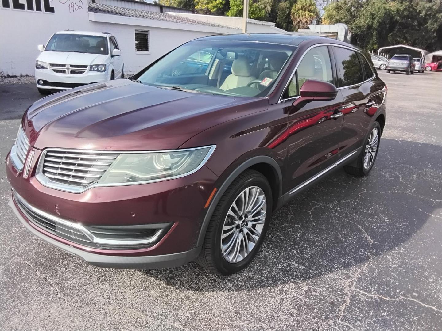 2017 RED LT /Beige Lincoln MKX Reserve (2LMPJ6LR8HB) with an 3.7L V6 DOHC 24V engine, 6A transmission, located at 6112 N Florida Avenue, Tampa, FL, 33604, (888) 521-5131, 27.954929, -82.459534 - 499$ DOWN PLUS TAX & TAG. - Photo#5