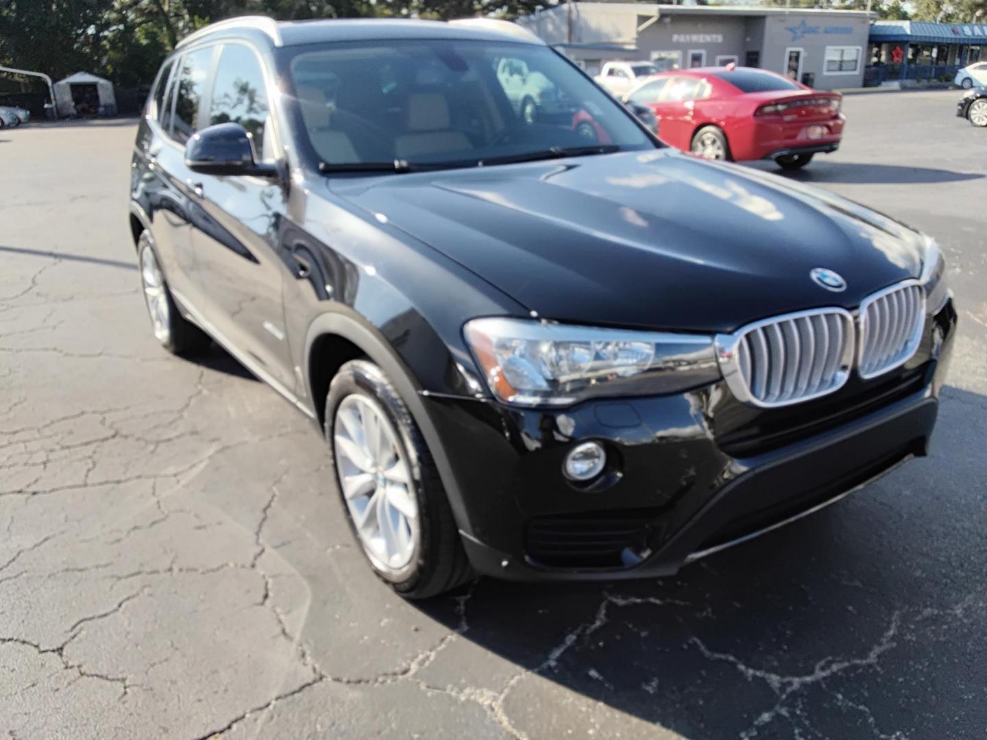 2017 BLACK /Beige BMW X3 sDrive28i (5UXWZ7C38H0) with an 2.0L L4 DOHC 16V engine, 8A transmission, located at 6112 N Florida Avenue, Tampa, FL, 33604, (888) 521-5131, 27.954929, -82.459534 - 499$ DOWN PLUS TAX & TAG. - Photo#2