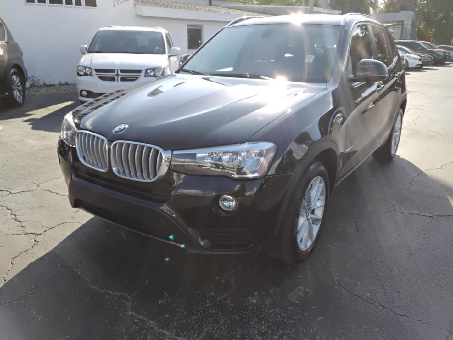 2017 BLACK /Beige BMW X3 sDrive28i (5UXWZ7C38H0) with an 2.0L L4 DOHC 16V engine, 8A transmission, located at 6112 N Florida Avenue, Tampa, FL, 33604, (888) 521-5131, 27.954929, -82.459534 - 499$ DOWN PLUS TAX & TAG. - Photo#1