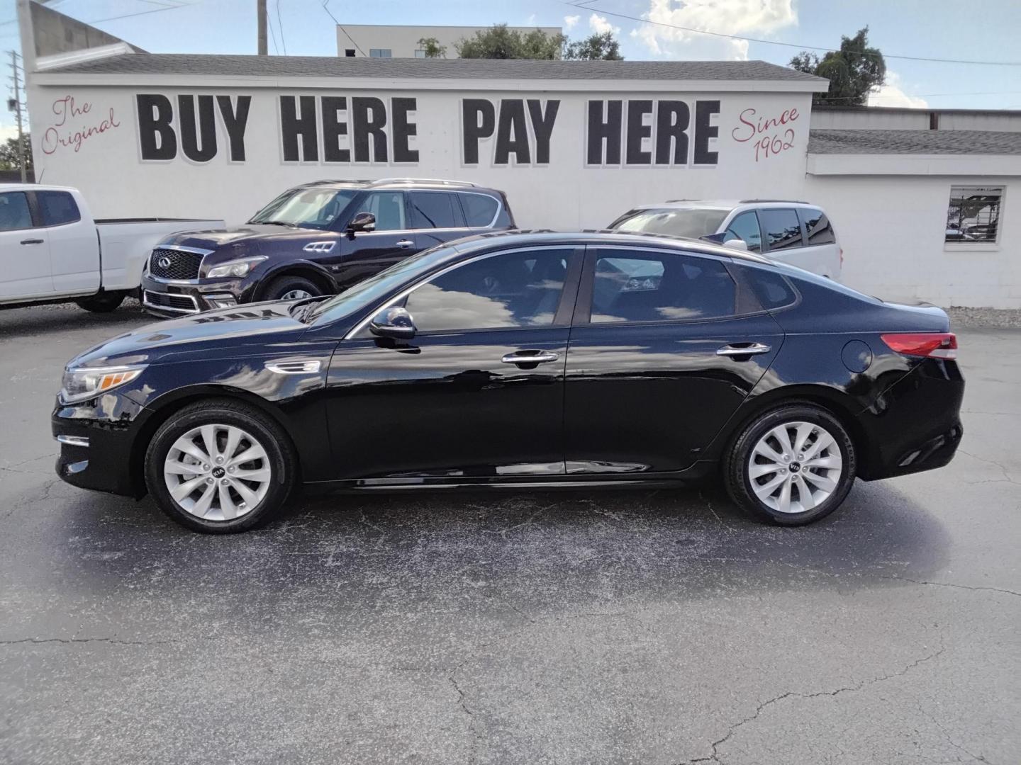 2018 BLACK /Grey Kia Optima LX (5XXGT4L35JG) with an 2.4L L4 DOHC 16V engine, 6A transmission, located at 6112 N Florida Avenue, Tampa, FL, 33604, (888) 521-5131, 27.954929, -82.459534 - 499$ DOWN PLUS TAX & TAG. - Photo#0