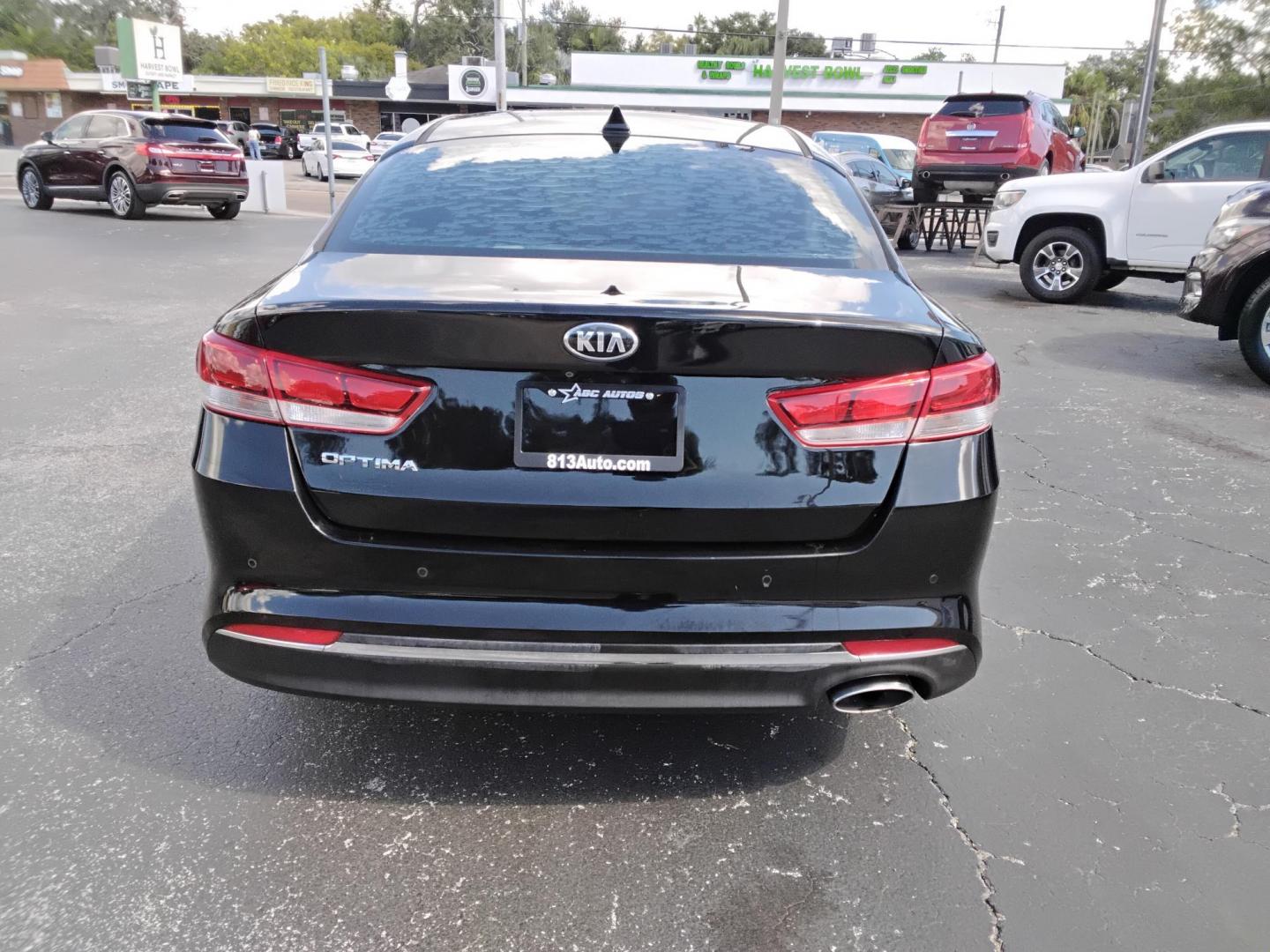 2018 BLACK /Grey Kia Optima LX (5XXGT4L35JG) with an 2.4L L4 DOHC 16V engine, 6A transmission, located at 6112 N Florida Avenue, Tampa, FL, 33604, (888) 521-5131, 27.954929, -82.459534 - 499$ DOWN PLUS TAX & TAG. - Photo#6