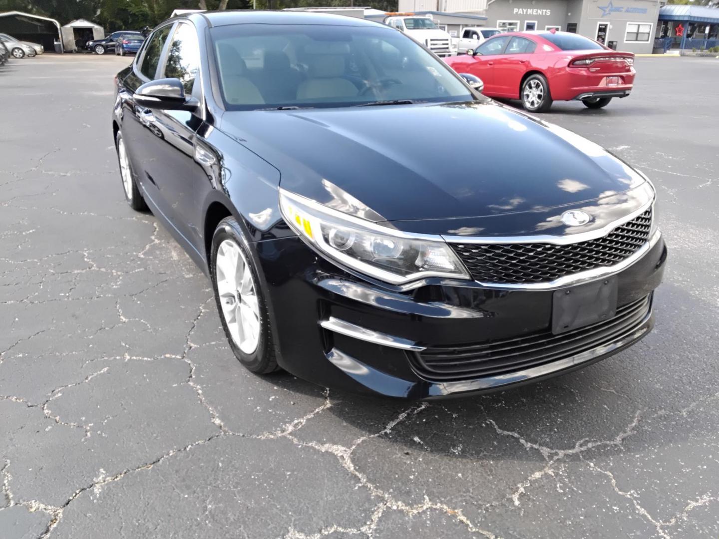 2018 BLACK /Grey Kia Optima LX (5XXGT4L35JG) with an 2.4L L4 DOHC 16V engine, 6A transmission, located at 6112 N Florida Avenue, Tampa, FL, 33604, (888) 521-5131, 27.954929, -82.459534 - 499$ DOWN PLUS TAX & TAG. - Photo#3