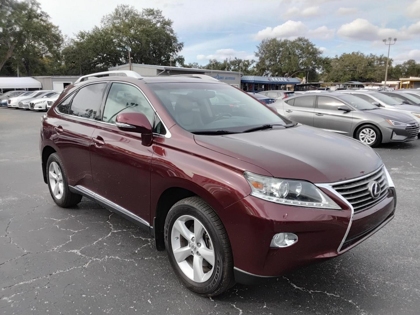 2014 Red /Brown Lexus RX 350 FWD (2T2ZK1BA4EC) with an 3.5L V6 DOHC 24V engine, 5-Speed Automatic transmission, located at 6112 N Florida Avenue, Tampa, FL, 33604, (888) 521-5131, 27.954929, -82.459534 - 499$ down plus tax & tag. - Photo#4