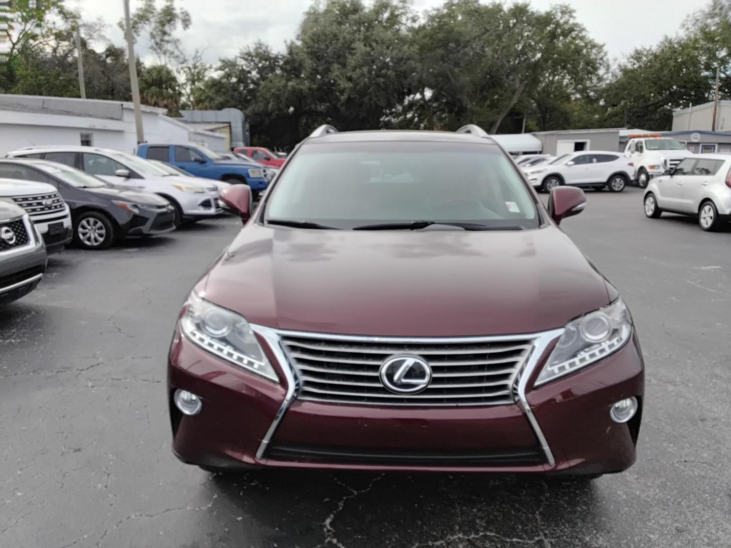 2014 Red /Brown Lexus RX 350 FWD (2T2ZK1BA4EC) with an 3.5L V6 DOHC 24V engine, 5-Speed Automatic transmission, located at 6112 N Florida Avenue, Tampa, FL, 33604, (888) 521-5131, 27.954929, -82.459534 - 499$ down plus tax & tag. - Photo#2