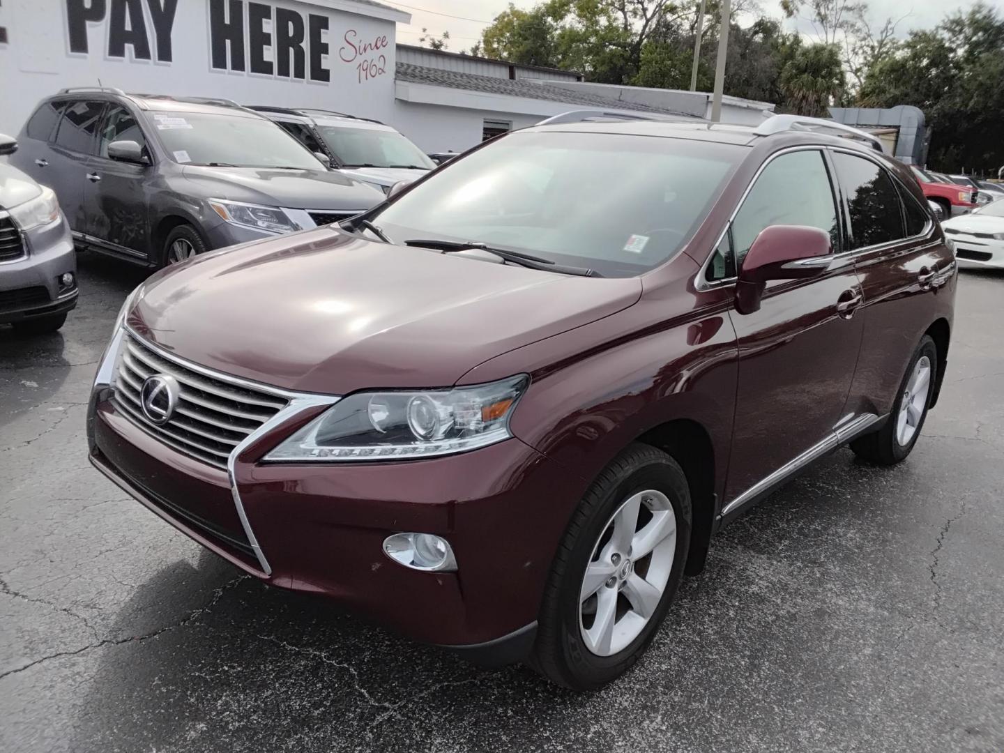 2014 Red /Brown Lexus RX 350 FWD (2T2ZK1BA4EC) with an 3.5L V6 DOHC 24V engine, 5-Speed Automatic transmission, located at 6112 N Florida Avenue, Tampa, FL, 33604, (888) 521-5131, 27.954929, -82.459534 - 499$ down plus tax & tag. - Photo#1
