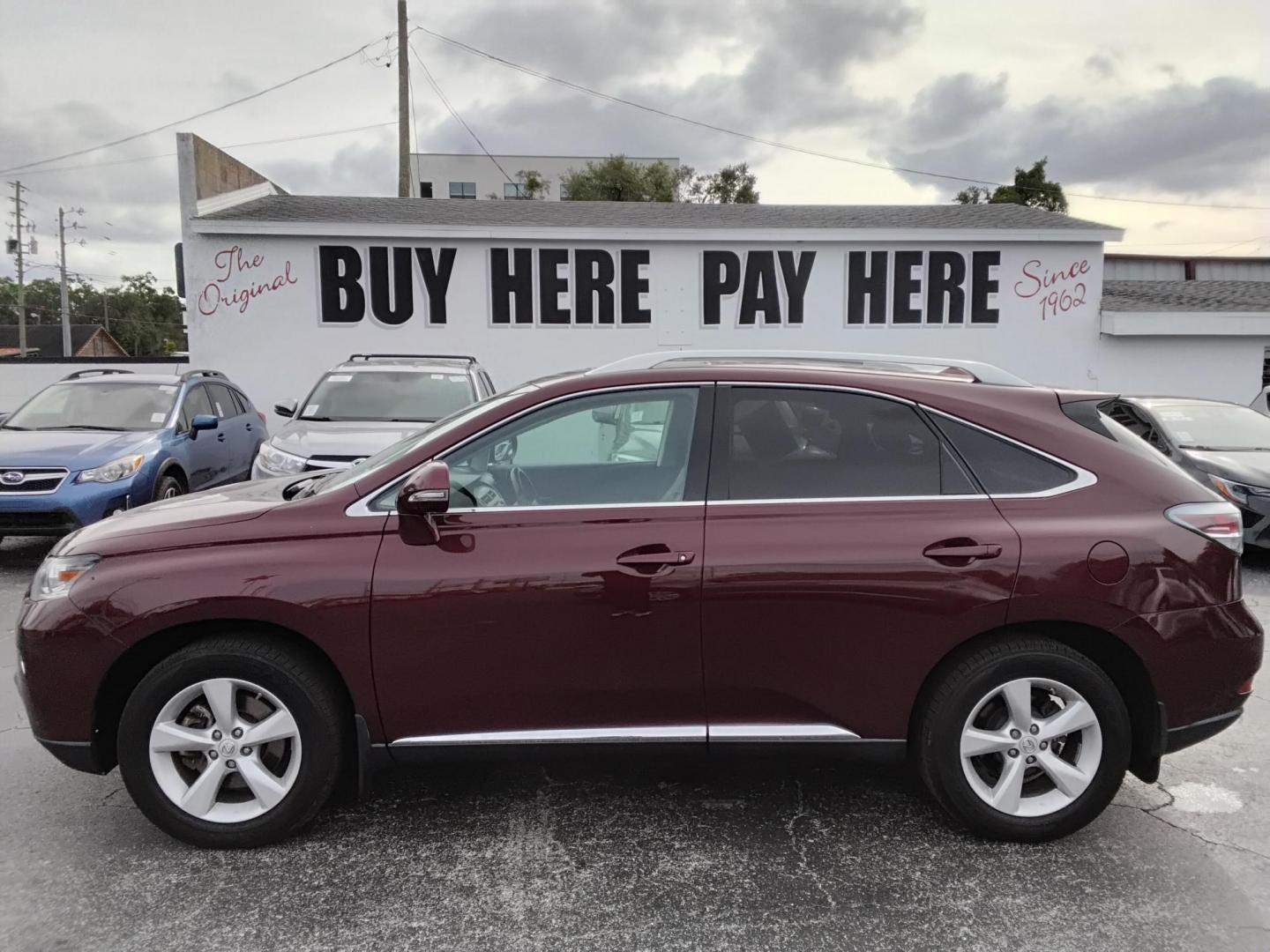 2014 Red /Brown Lexus RX 350 FWD (2T2ZK1BA4EC) with an 3.5L V6 DOHC 24V engine, 5-Speed Automatic transmission, located at 6112 N Florida Avenue, Tampa, FL, 33604, (888) 521-5131, 27.954929, -82.459534 - 499$ down plus tax & tag. - Photo#0