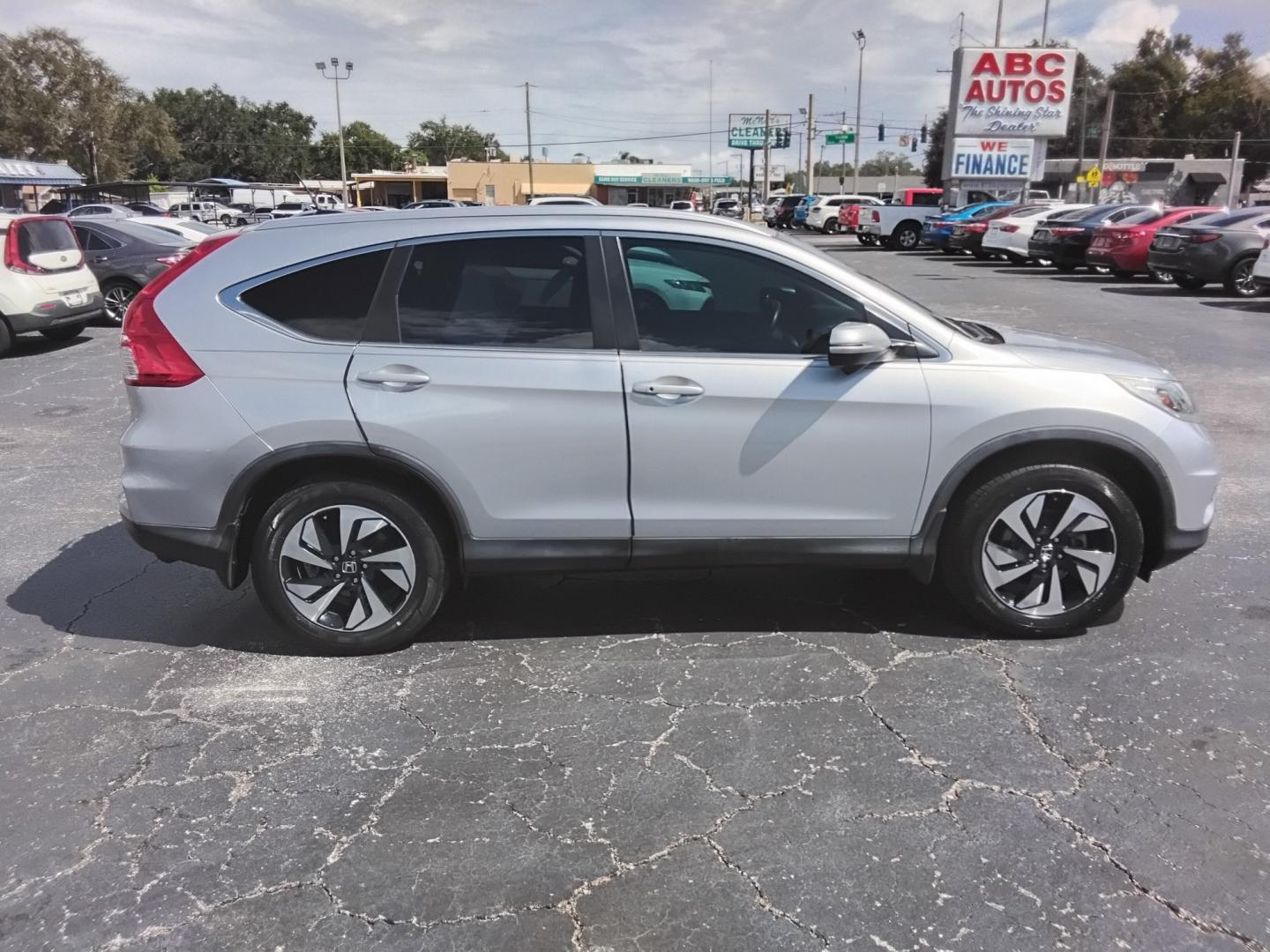2015 SILVER /Beige Honda CR-V EX-L 2WD (5J6RM3H92FL) with an 2.4L L4 DOHC 16V engine, Continuously Variable Transmission transmission, located at 6112 N Florida Avenue, Tampa, FL, 33604, (888) 521-5131, 27.954929, -82.459534 - 499$ DOWN PLUS TAX & TAG.- Photo#1