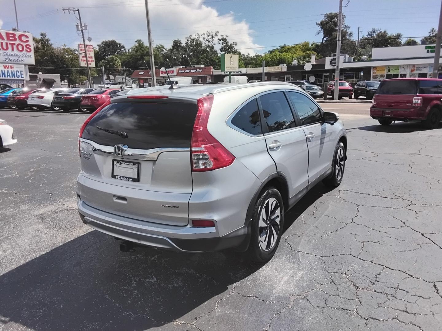 2015 SILVER /Beige Honda CR-V EX-L 2WD (5J6RM3H92FL) with an 2.4L L4 DOHC 16V engine, Continuously Variable Transmission transmission, located at 6112 N Florida Avenue, Tampa, FL, 33604, (888) 521-5131, 27.954929, -82.459534 - 499$ DOWN PLUS TAX & TAG.- Photo#5