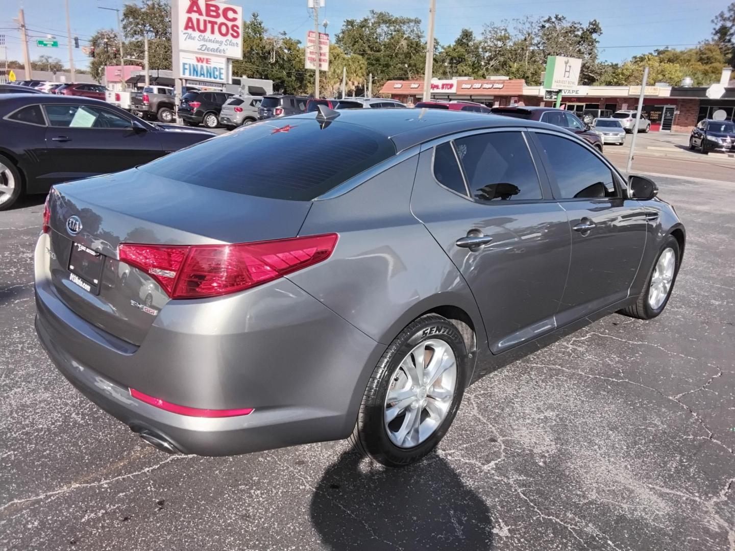 2012 SILVER /Grey Kia Optima EX (5XXGN4A70CG) with an 2.4L L4 DOHC 16V engine, 6-Speed Automatic transmission, located at 6112 N Florida Avenue, Tampa, FL, 33604, (888) 521-5131, 27.954929, -82.459534 - $499 Plus tax & tag. - Photo#9