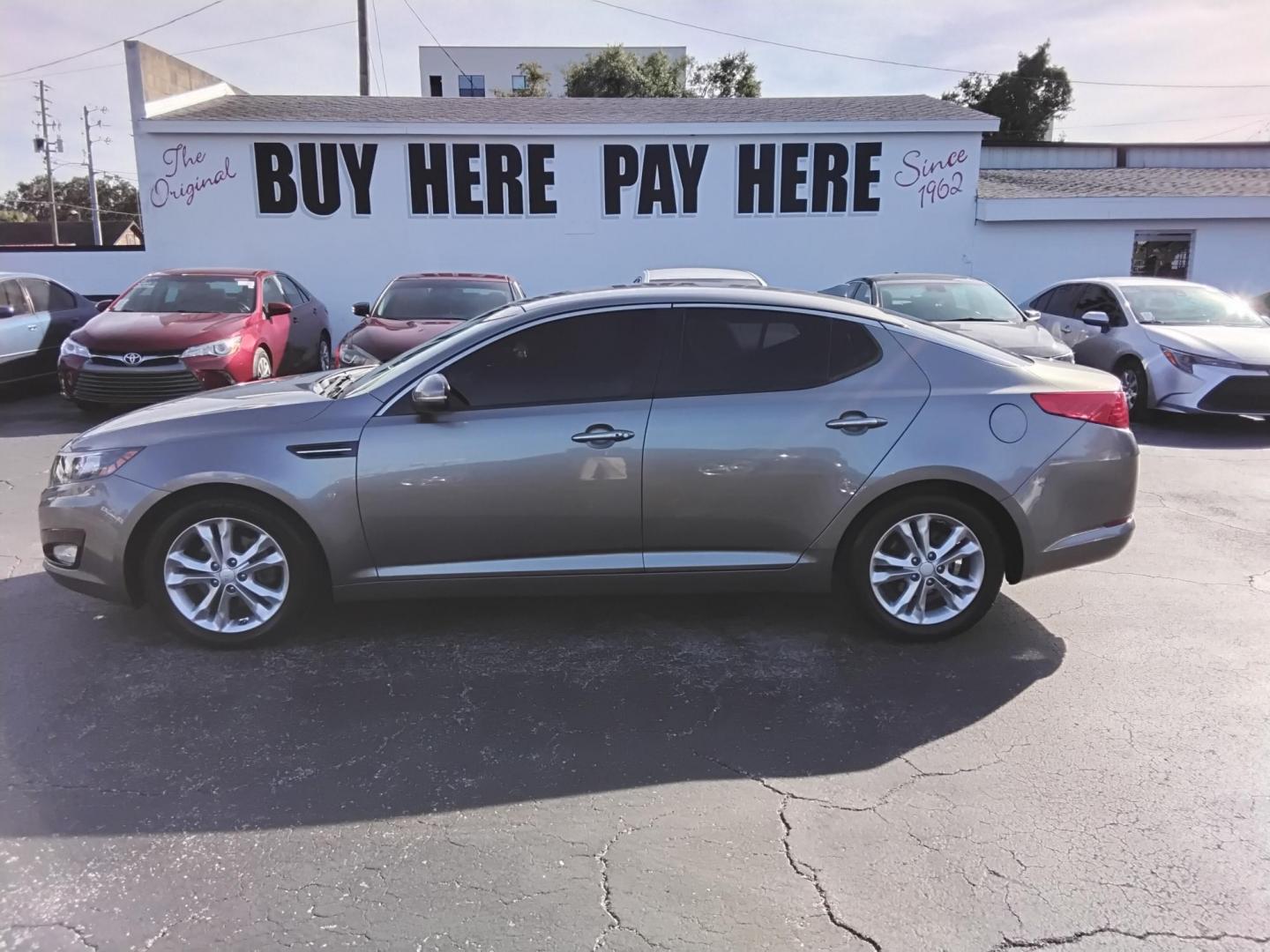 2012 SILVER /Grey Kia Optima EX (5XXGN4A70CG) with an 2.4L L4 DOHC 16V engine, 6-Speed Automatic transmission, located at 6112 N Florida Avenue, Tampa, FL, 33604, (888) 521-5131, 27.954929, -82.459534 - $499 Plus tax & tag. - Photo#0