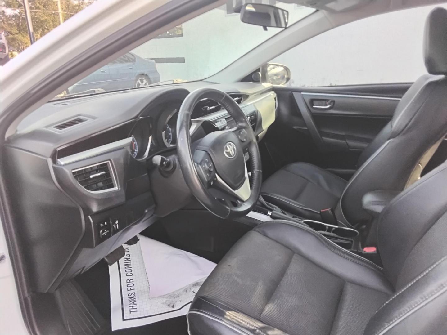 2016 White /Grey Toyota Corolla L 4-Speed AT (5YFBURHE0GP) with an 1.8L L4 DOHC 16V engine, 4A transmission, located at 6112 N Florida Avenue, Tampa, FL, 33604, (888) 521-5131, 27.954929, -82.459534 - 499$ DOWN PLUS TAX & TAG. - Photo#7