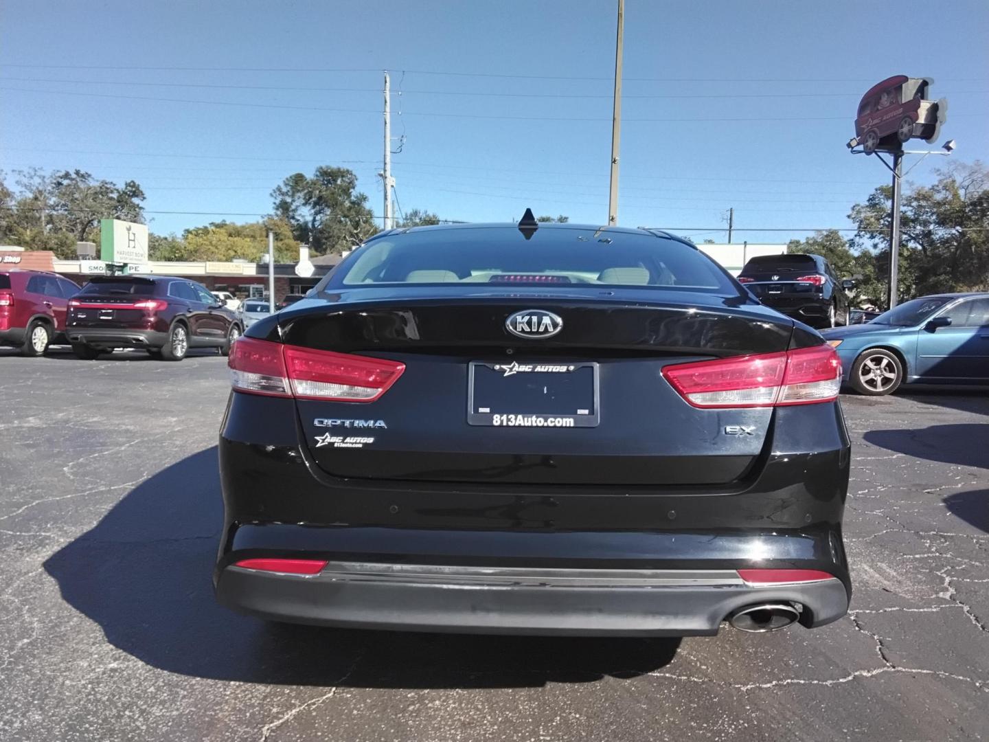 2016 BLACK /Grey Kia Optima EX (5XXGU4L39GG) with an 2.4L L4 DOHC 16V engine, 6A transmission, located at 6112 N Florida Avenue, Tampa, FL, 33604, (888) 521-5131, 27.954929, -82.459534 - 499$ down plus tax & tag. - Photo#4