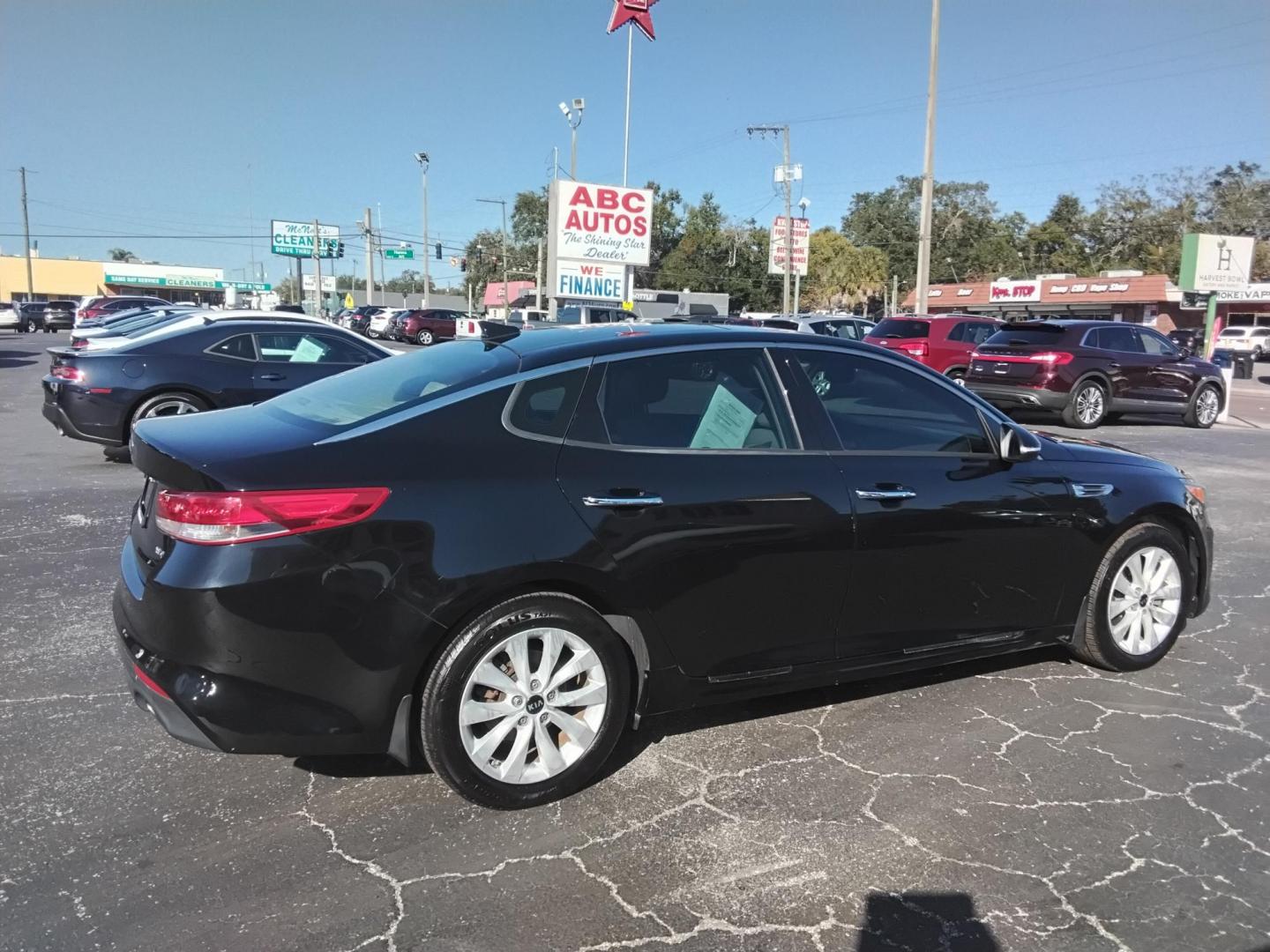 2016 BLACK /Grey Kia Optima EX (5XXGU4L39GG) with an 2.4L L4 DOHC 16V engine, 6A transmission, located at 6112 N Florida Avenue, Tampa, FL, 33604, (888) 521-5131, 27.954929, -82.459534 - 499$ down plus tax & tag. - Photo#3
