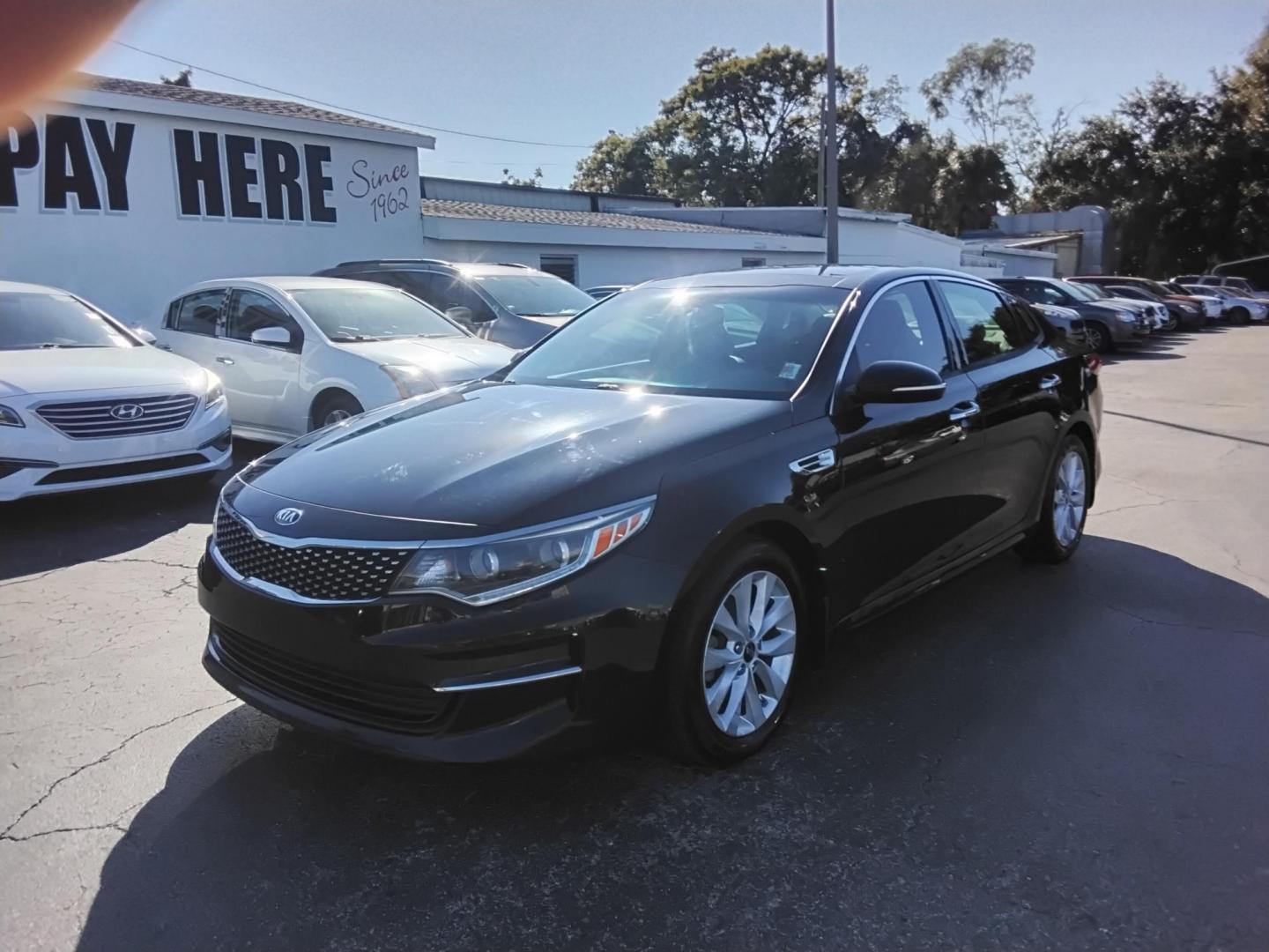 2016 BLACK /Grey Kia Optima EX (5XXGU4L39GG) with an 2.4L L4 DOHC 16V engine, 6A transmission, located at 6112 N Florida Avenue, Tampa, FL, 33604, (888) 521-5131, 27.954929, -82.459534 - 499$ down plus tax & tag. - Photo#1