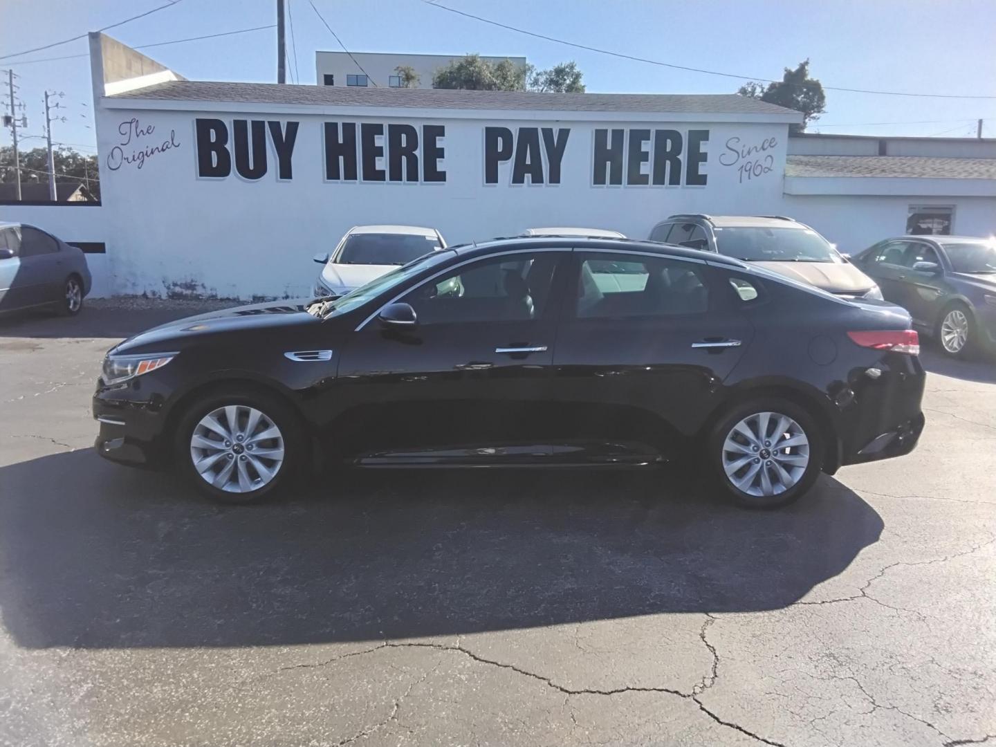 2016 BLACK /Grey Kia Optima EX (5XXGU4L39GG) with an 2.4L L4 DOHC 16V engine, 6A transmission, located at 6112 N Florida Avenue, Tampa, FL, 33604, (888) 521-5131, 27.954929, -82.459534 - 499$ down plus tax & tag. - Photo#0