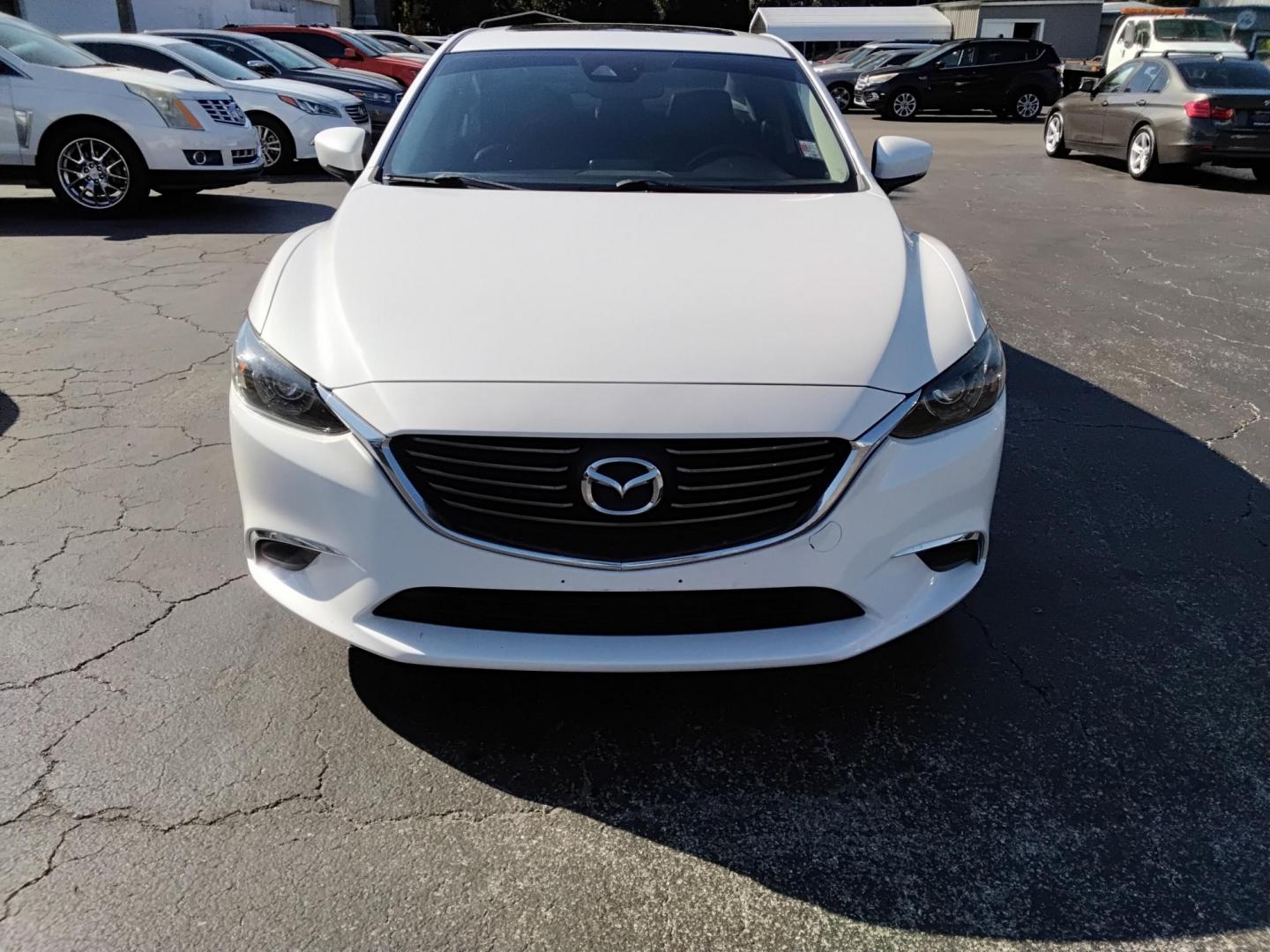 2017 White /Black Mazda Mazda6 i Touring AT (JM1GL1V53H1) with an 2.5L L4 DOHC 16V engine, 6A transmission, located at 6112 N Florida Avenue, Tampa, FL, 33604, (888) 521-5131, 27.954929, -82.459534 - 499$ down plus tax & tag. - Photo#2