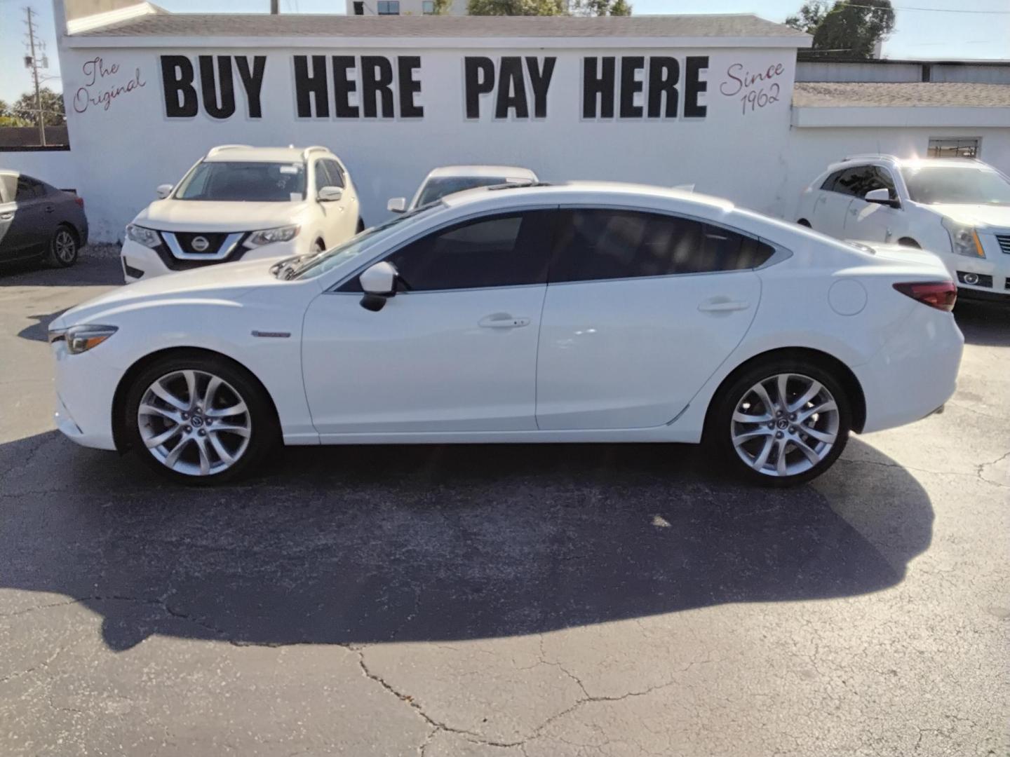 2017 White /Black Mazda Mazda6 i Touring AT (JM1GL1V53H1) with an 2.5L L4 DOHC 16V engine, 6A transmission, located at 6112 N Florida Avenue, Tampa, FL, 33604, (888) 521-5131, 27.954929, -82.459534 - 499$ down plus tax & tag. - Photo#0