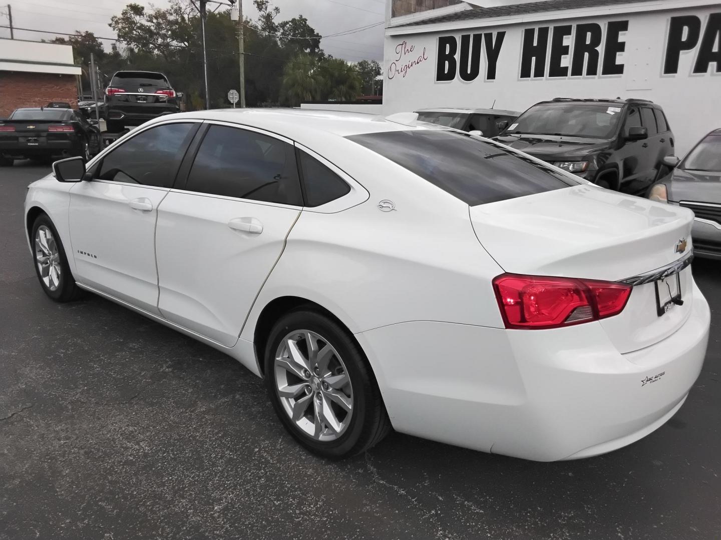 2017 White /Grey Chevrolet Impala LT (2G1105SA0H9) with an 2.5L L4 DOHC 16V engine, 6A transmission, located at 6112 N Florida Avenue, Tampa, FL, 33604, (888) 521-5131, 27.954929, -82.459534 - $499 DOWN PLUS TAX & TAG. - Photo#3