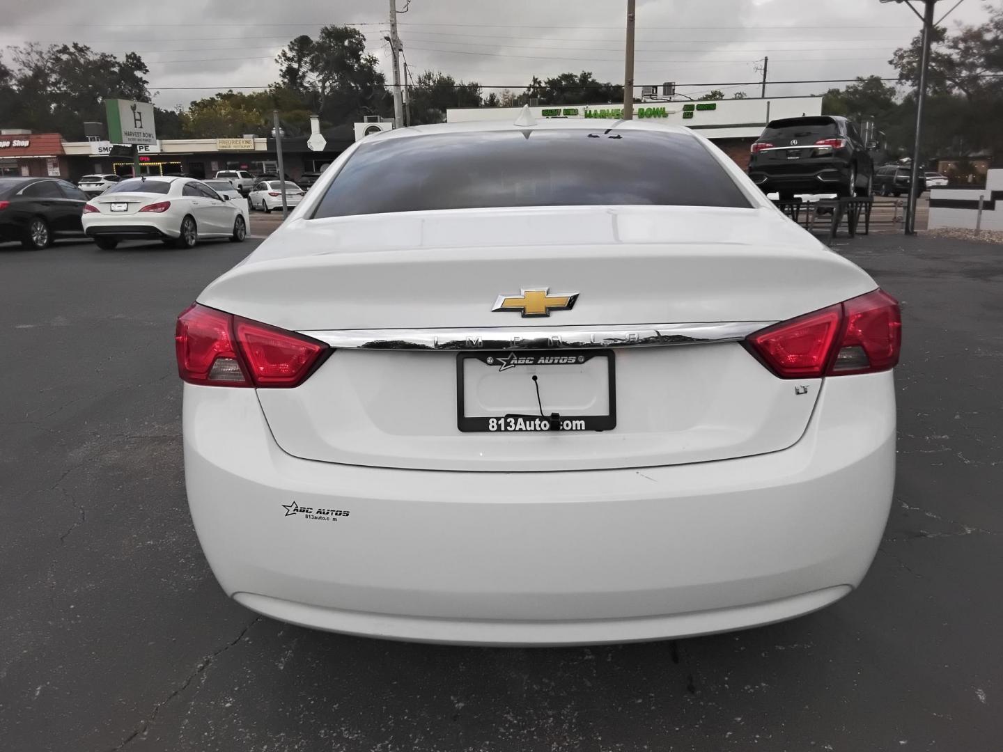 2017 White /Grey Chevrolet Impala LT (2G1105SA0H9) with an 2.5L L4 DOHC 16V engine, 6A transmission, located at 6112 N Florida Avenue, Tampa, FL, 33604, (888) 521-5131, 27.954929, -82.459534 - $499 DOWN PLUS TAX & TAG. - Photo#5