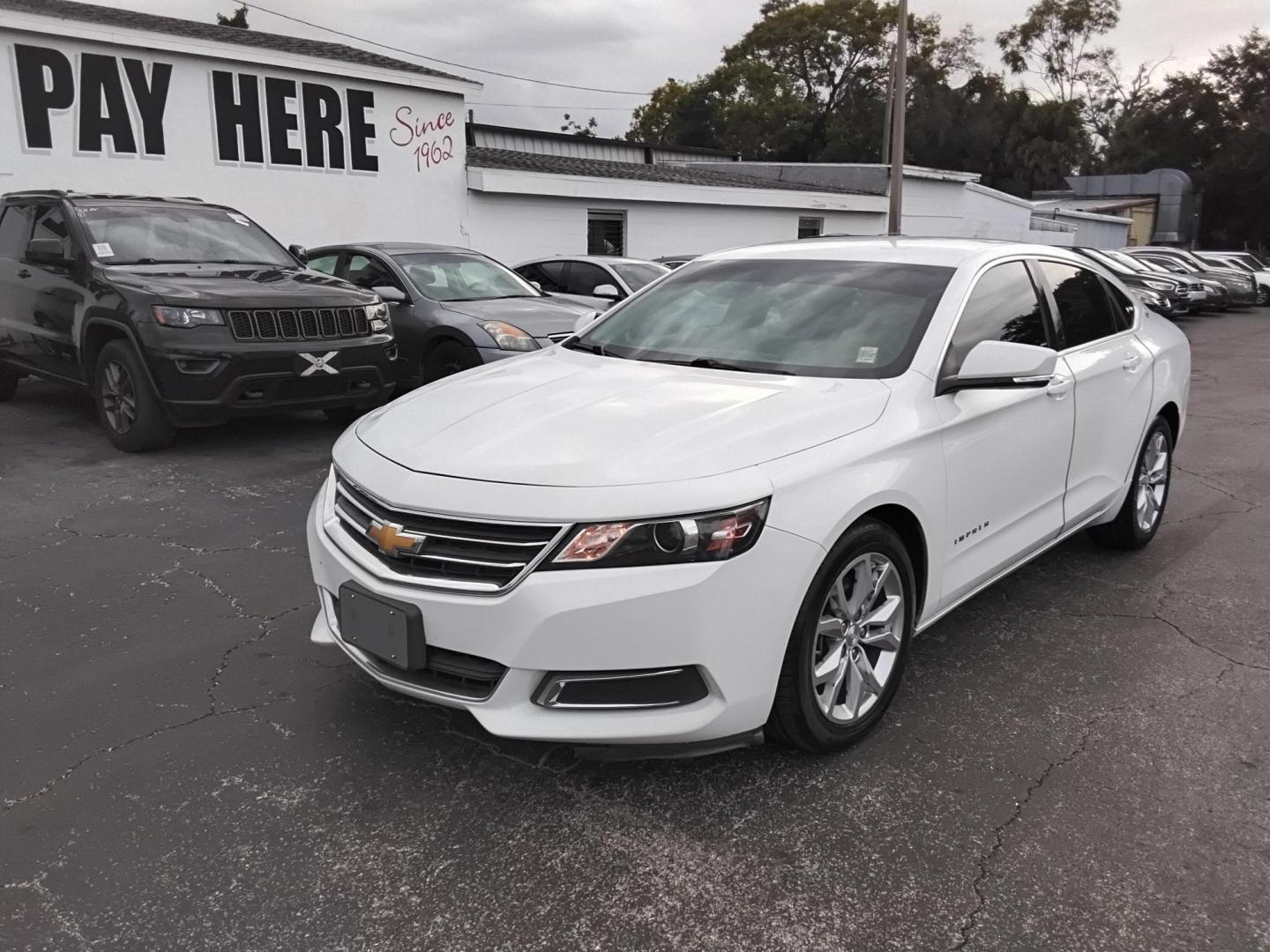2017 White /Grey Chevrolet Impala LT (2G1105SA0H9) with an 2.5L L4 DOHC 16V engine, 6A transmission, located at 6112 N Florida Avenue, Tampa, FL, 33604, (888) 521-5131, 27.954929, -82.459534 - $499 DOWN PLUS TAX & TAG. - Photo#2