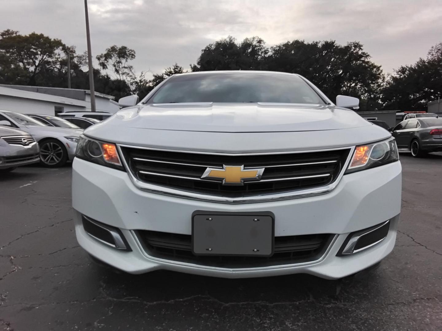 2017 White /Grey Chevrolet Impala LT (2G1105SA0H9) with an 2.5L L4 DOHC 16V engine, 6A transmission, located at 6112 N Florida Avenue, Tampa, FL, 33604, (888) 521-5131, 27.954929, -82.459534 - $499 DOWN PLUS TAX & TAG. - Photo#1