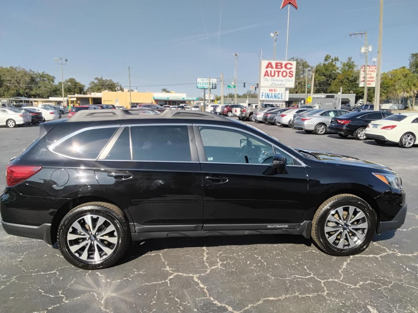 2015 BLACK /Black Subaru Outback 3.6R Limited (4S4BSENCXF3) with an 3.6L H6 DOHC 24V engine, 6-Speed Automatic transmission, located at 6112 N Florida Avenue, Tampa, FL, 33604, (888) 521-5131, 27.954929, -82.459534 - $499 DOWN PLUS TAX & TAG. - Photo#1
