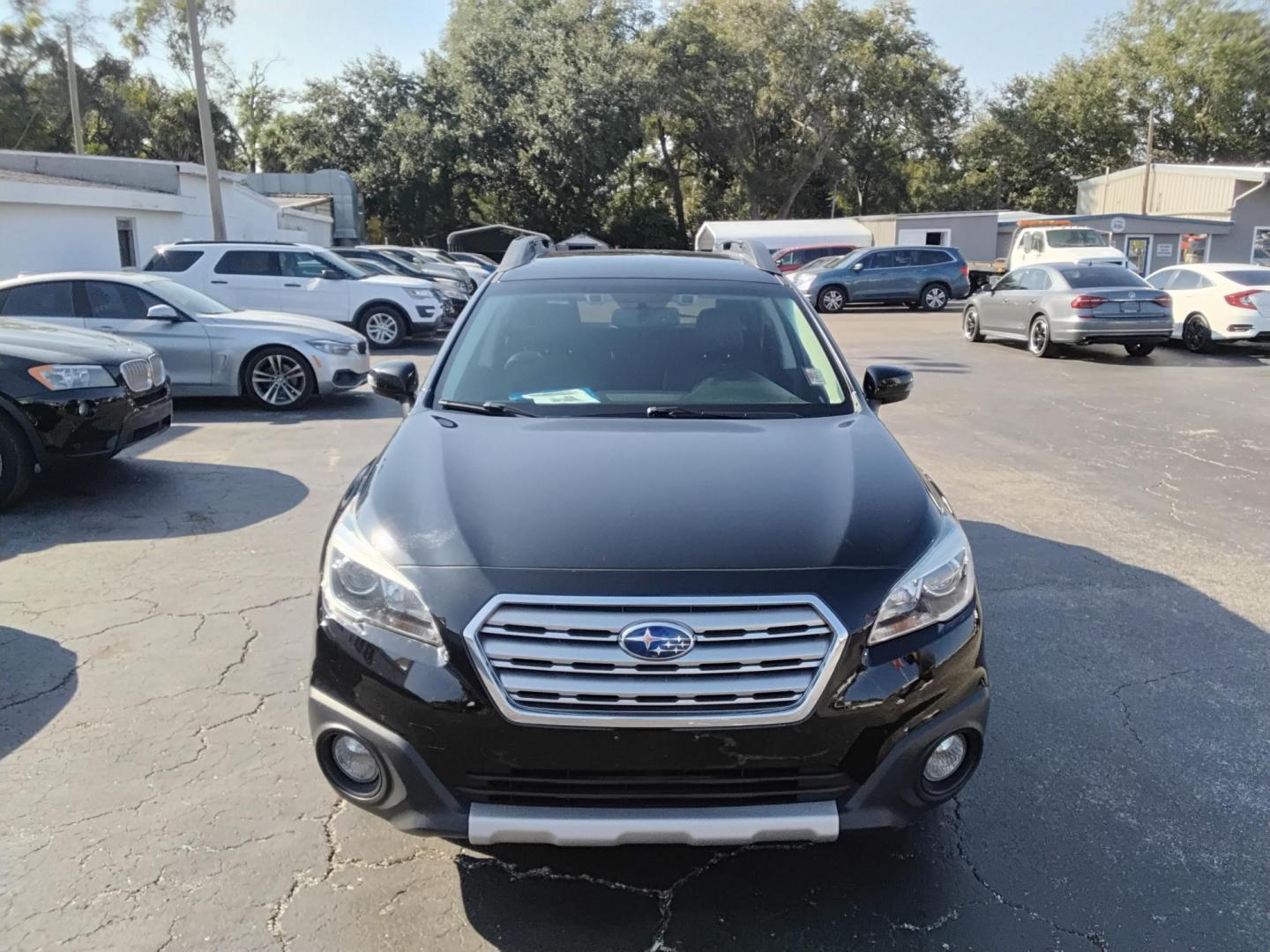 2015 BLACK /Black Subaru Outback 3.6R Limited (4S4BSENCXF3) with an 3.6L H6 DOHC 24V engine, 6-Speed Automatic transmission, located at 6112 N Florida Avenue, Tampa, FL, 33604, (888) 521-5131, 27.954929, -82.459534 - $499 DOWN PLUS TAX & TAG. - Photo#2