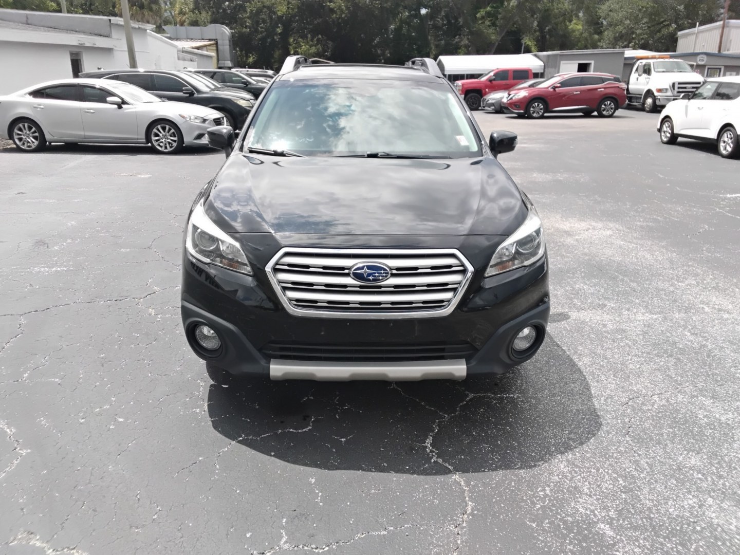 2015 BLACK /Black Subaru Outback 3.6R Limited (4S4BSENCXF3) with an 3.6L H6 DOHC 24V engine, 6-Speed Automatic transmission, located at 6112 N Florida Avenue, Tampa, FL, 33604, (888) 521-5131, 27.954929, -82.459534 - $499 DOWN PLUS TAX & TAG.- Photo#2