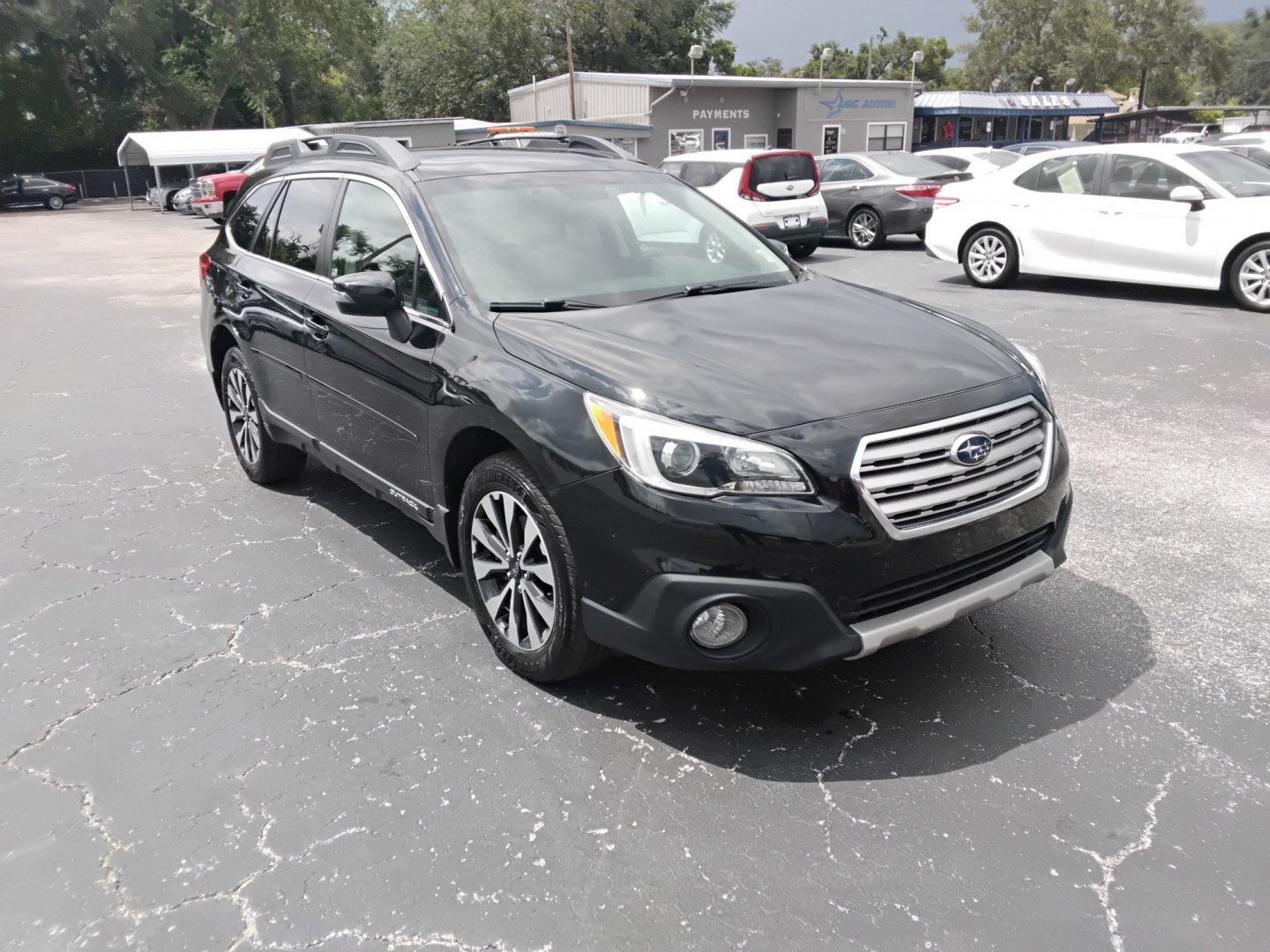 2015 BLACK /Black Subaru Outback 3.6R Limited (4S4BSENCXF3) with an 3.6L H6 DOHC 24V engine, 6-Speed Automatic transmission, located at 6112 N Florida Avenue, Tampa, FL, 33604, (888) 521-5131, 27.954929, -82.459534 - $499 DOWN PLUS TAX & TAG.- Photo#3