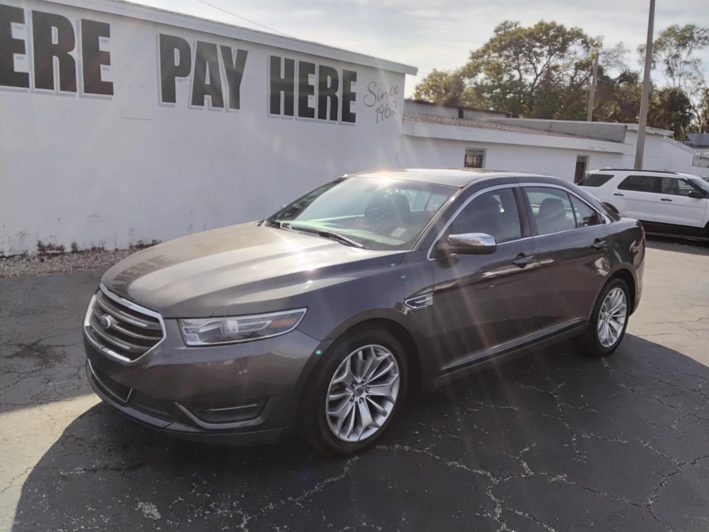 2016 GRAY /Grey Ford Taurus Limited FWD (1FAHP2F80GG) with an 3.5L V6 DOHC 24V engine, 6A transmission, located at 6112 N Florida Avenue, Tampa, FL, 33604, (888) 521-5131, 27.954929, -82.459534 - $499 down plus tax & tag. - Photo#2