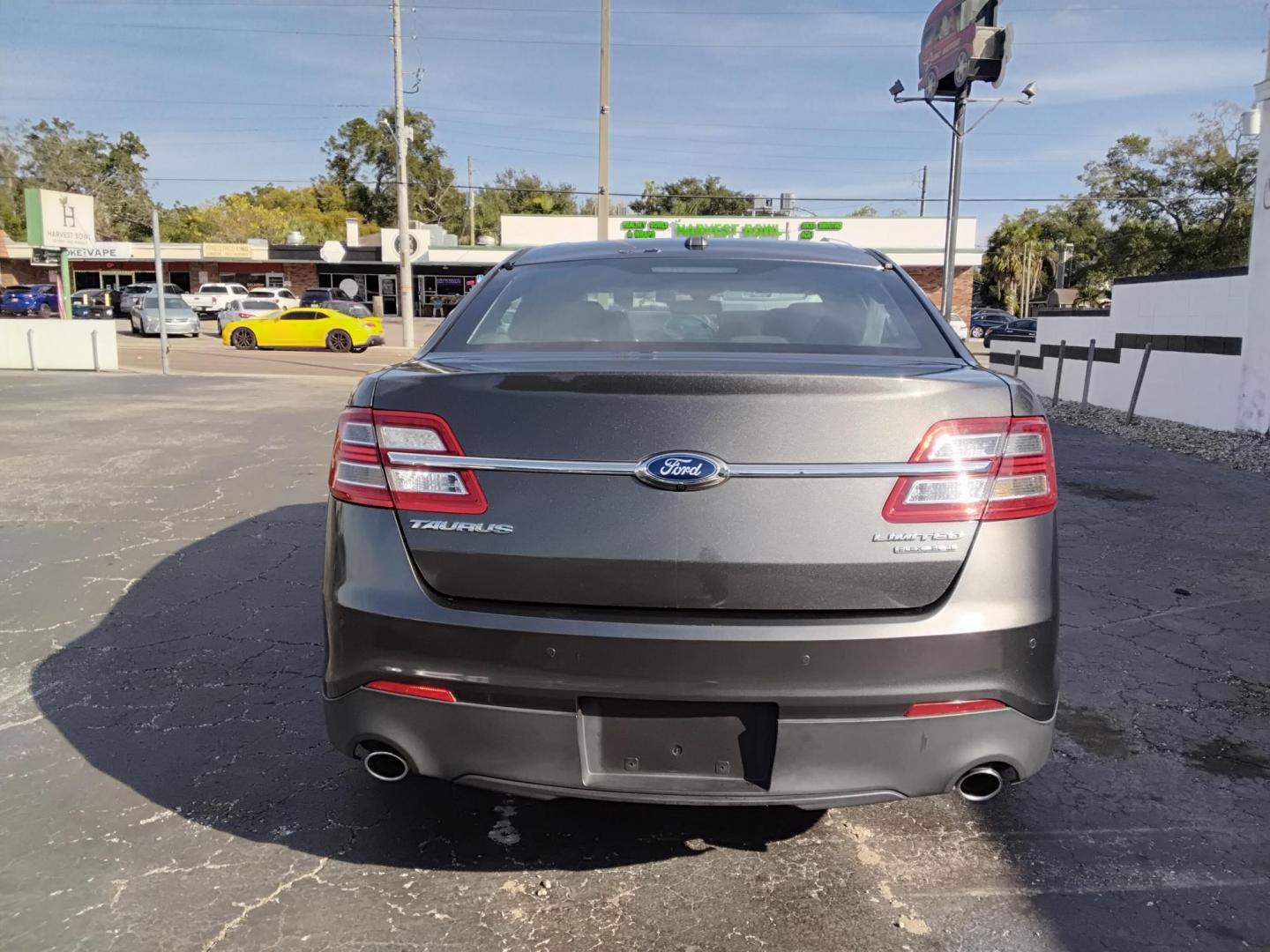 2016 GRAY /Grey Ford Taurus Limited FWD (1FAHP2F80GG) with an 3.5L V6 DOHC 24V engine, 6A transmission, located at 6112 N Florida Avenue, Tampa, FL, 33604, (888) 521-5131, 27.954929, -82.459534 - $499 down plus tax & tag. - Photo#6