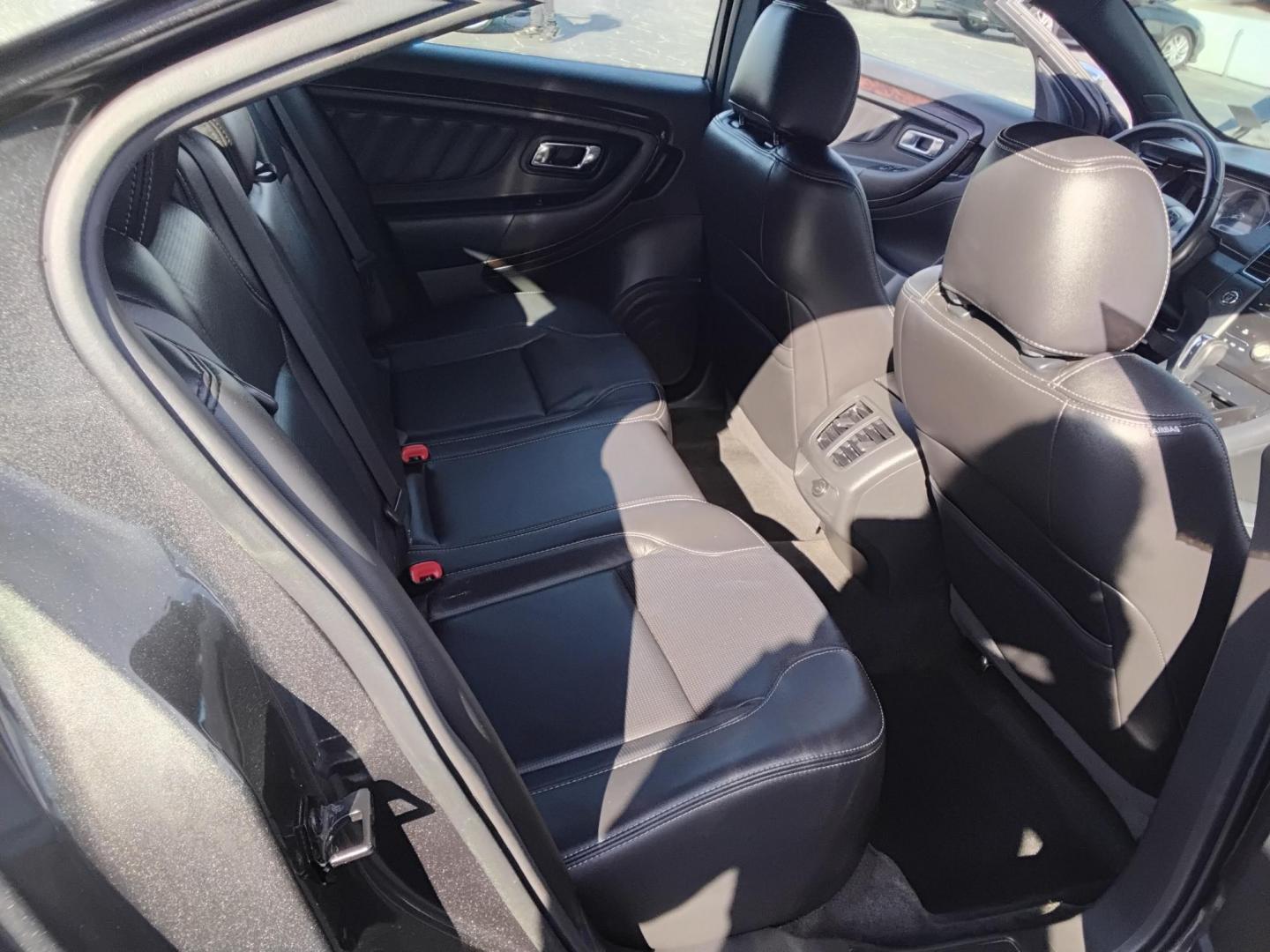 2016 GRAY /Grey Ford Taurus Limited FWD (1FAHP2F80GG) with an 3.5L V6 DOHC 24V engine, 6A transmission, located at 6112 N Florida Avenue, Tampa, FL, 33604, (888) 521-5131, 27.954929, -82.459534 - $499 down plus tax & tag. - Photo#11