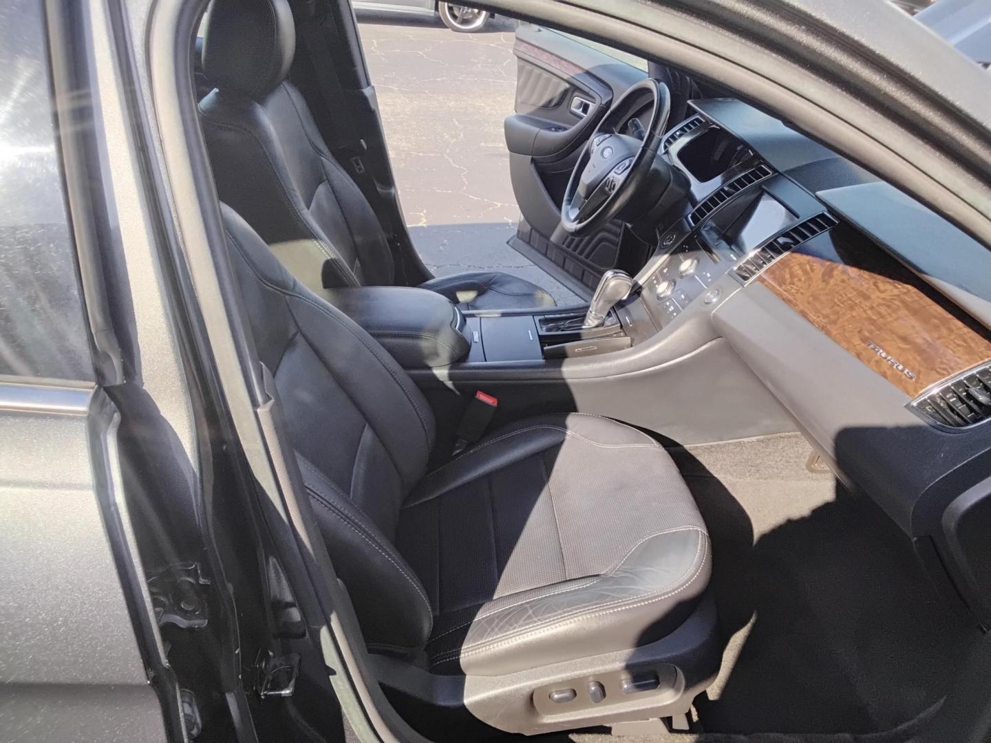 2016 GRAY /Grey Ford Taurus Limited FWD (1FAHP2F80GG) with an 3.5L V6 DOHC 24V engine, 6A transmission, located at 6112 N Florida Avenue, Tampa, FL, 33604, (888) 521-5131, 27.954929, -82.459534 - $499 down plus tax & tag. - Photo#10