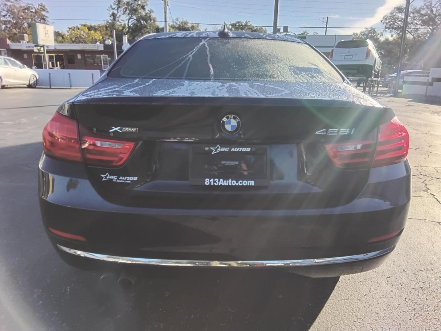 2014 DK BLUE /Brown BMW 4-Series 428i xDrive (WBA3N5C5XEK) with an 2.0L L4 DOHC 16V engine, located at 6112 N Florida Avenue, Tampa, FL, 33604, (888) 521-5131, 27.954929, -82.459534 - $499 down plus tax & tag. - Photo#4