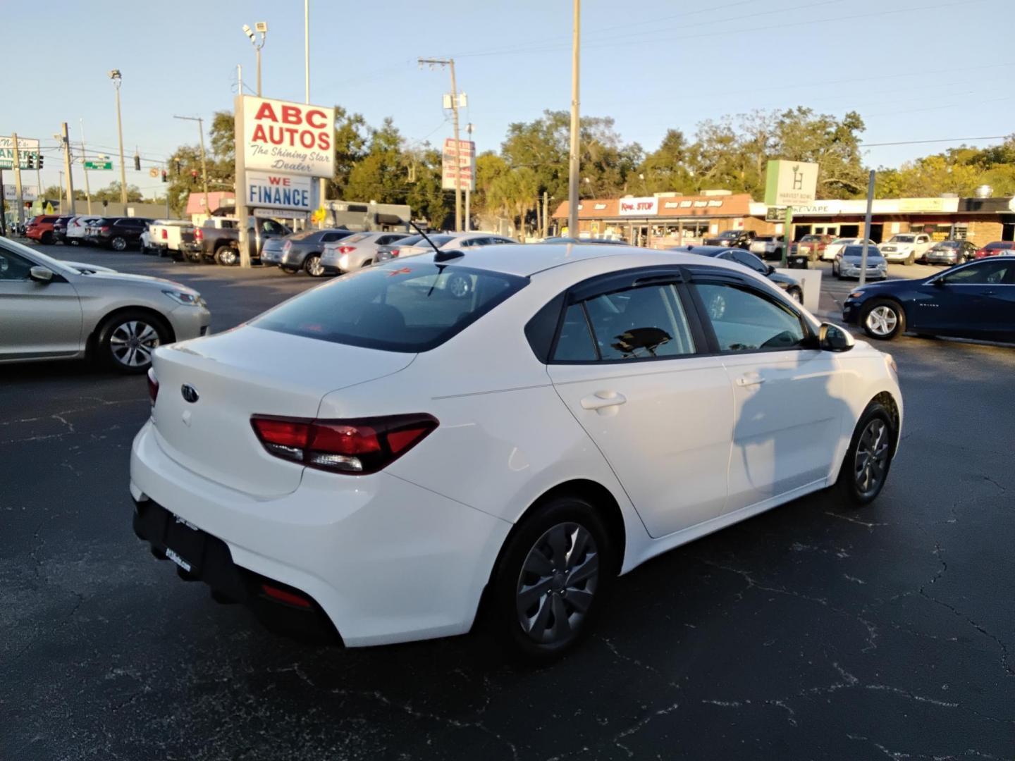 2019 White /Grey Kia Rio LX (3KPA24AB6KE) with an 1.6L L4 DOHC 16V engine, 6A transmission, located at 6112 N Florida Avenue, Tampa, FL, 33604, (888) 521-5131, 27.954929, -82.459534 - $499 DOWN PLUS TAX & TAG. - Photo#5