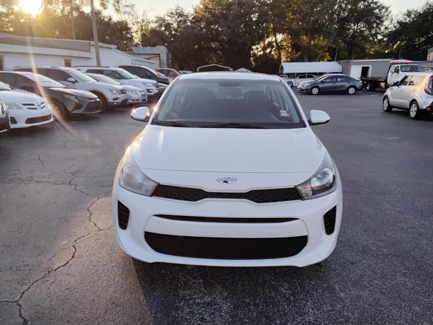2019 White /Grey Kia Rio LX (3KPA24AB6KE) with an 1.6L L4 DOHC 16V engine, 6A transmission, located at 6112 N Florida Avenue, Tampa, FL, 33604, (888) 521-5131, 27.954929, -82.459534 - $499 DOWN PLUS TAX & TAG. - Photo#2