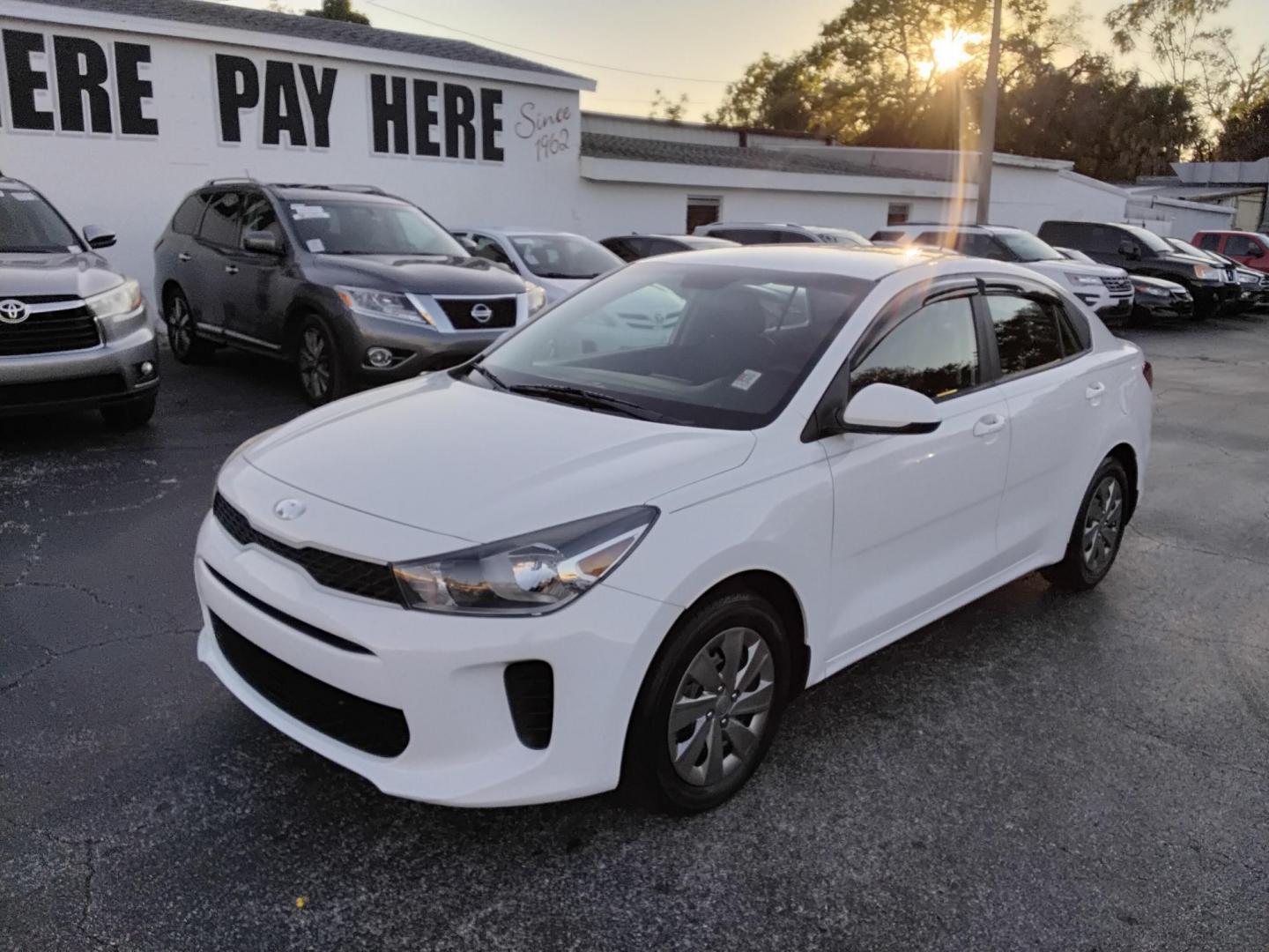 2019 White /Grey Kia Rio LX (3KPA24AB6KE) with an 1.6L L4 DOHC 16V engine, 6A transmission, located at 6112 N Florida Avenue, Tampa, FL, 33604, (888) 521-5131, 27.954929, -82.459534 - $499 DOWN PLUS TAX & TAG. - Photo#1