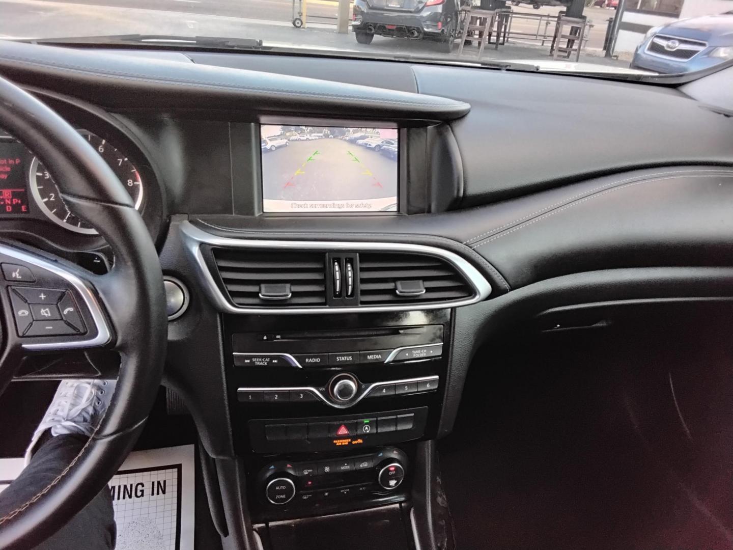 2018 White /Grey Infiniti QX30 Luxury (SJKCH5CP3JA) with an 2.0L L4 DOHC 16V engine, 7A transmission, located at 6112 N Florida Avenue, Tampa, FL, 33604, (888) 521-5131, 27.954929, -82.459534 - $499 down plus tax & tag. - Photo#9