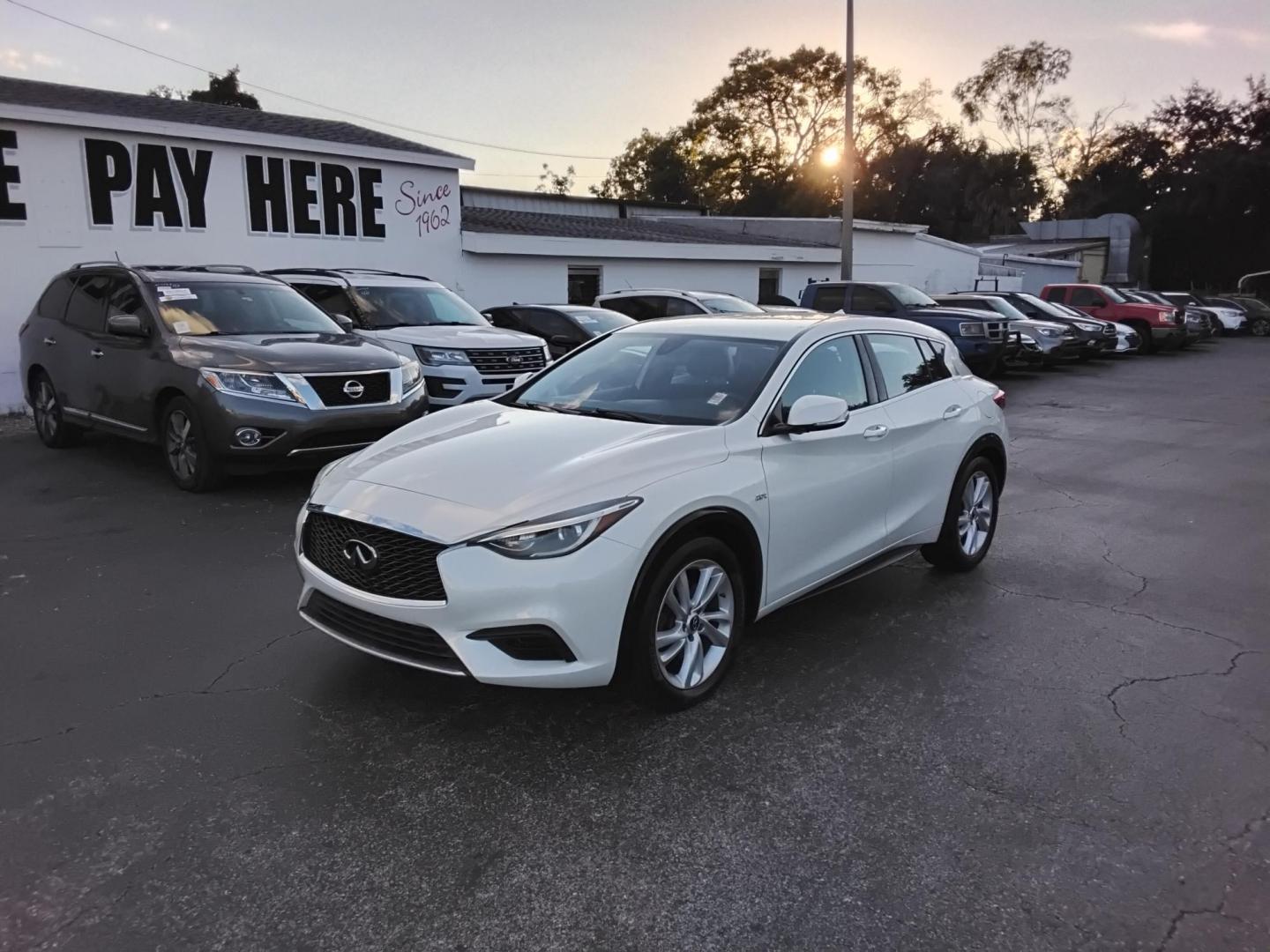 2018 White /Grey Infiniti QX30 Luxury (SJKCH5CP3JA) with an 2.0L L4 DOHC 16V engine, 7A transmission, located at 6112 N Florida Avenue, Tampa, FL, 33604, (888) 521-5131, 27.954929, -82.459534 - $499 down plus tax & tag. - Photo#2