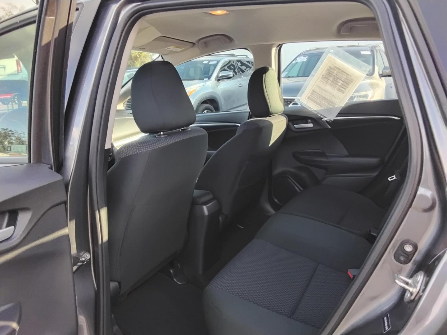 2019 GRAY /Grey Honda Fit LX CVT (3HGGK5H42KM) with an 1.5L L4 SOHC 16V engine, CVT transmission, located at 6112 N Florida Avenue, Tampa, FL, 33604, (888) 521-5131, 27.954929, -82.459534 - $499 DOWN PLUS TAX & TAG. - Photo#6