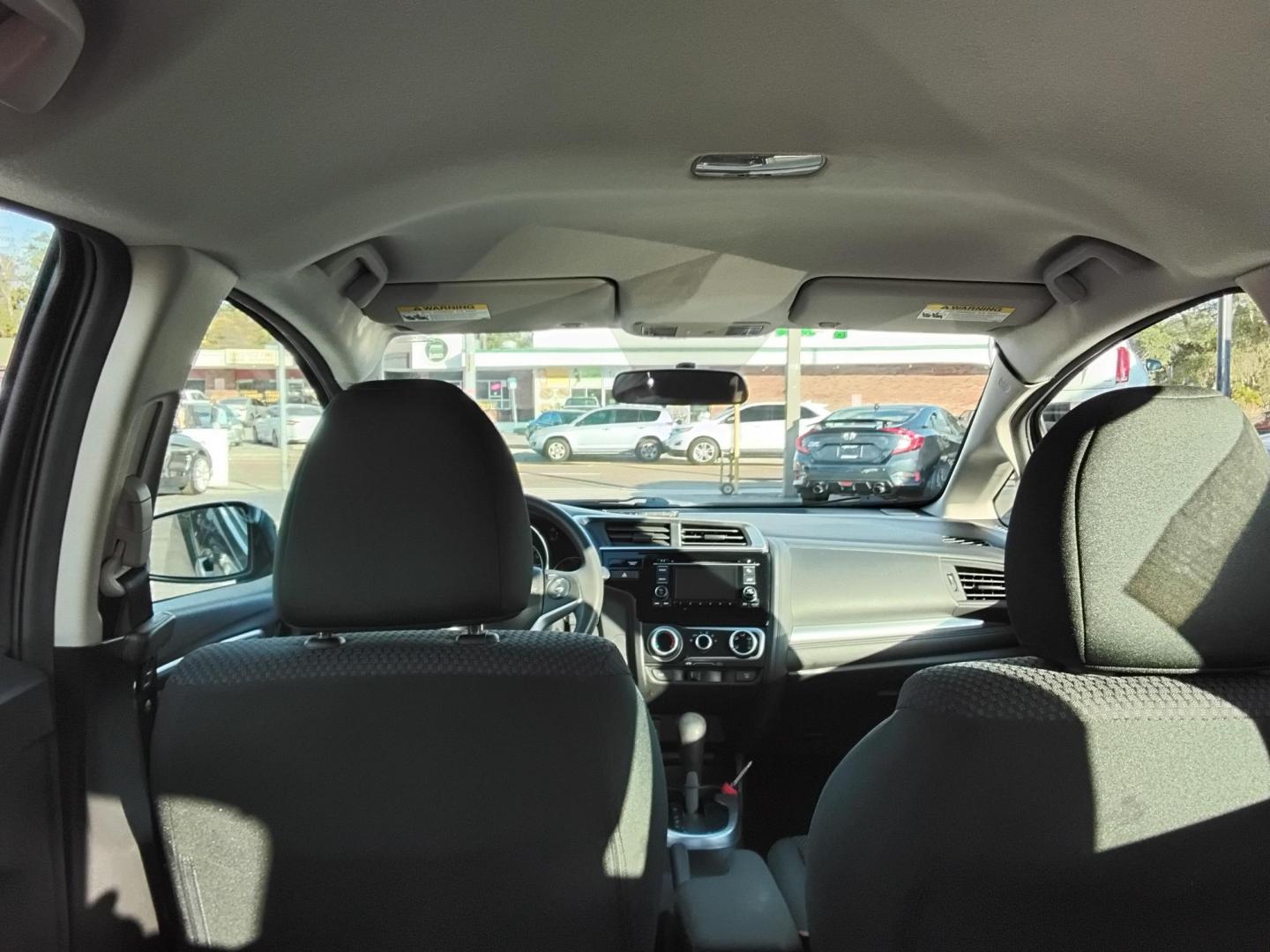 2019 GRAY /Grey Honda Fit LX CVT (3HGGK5H42KM) with an 1.5L L4 SOHC 16V engine, CVT transmission, located at 6112 N Florida Avenue, Tampa, FL, 33604, (888) 521-5131, 27.954929, -82.459534 - $499 DOWN PLUS TAX & TAG. - Photo#7