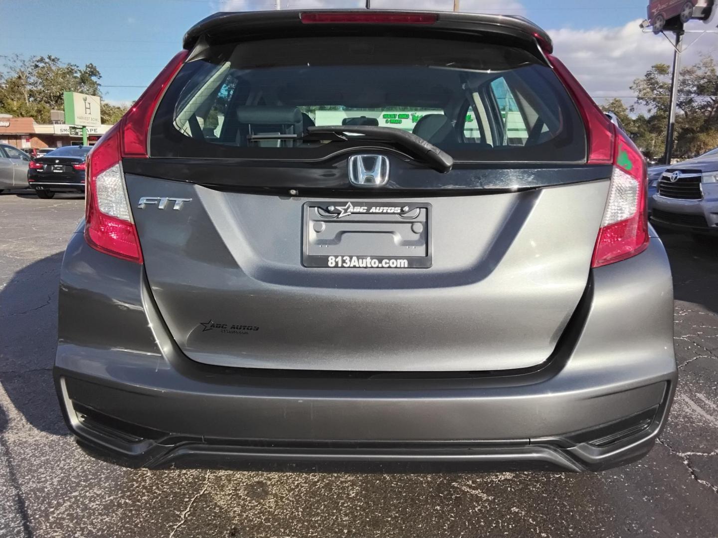 2019 GRAY /Grey Honda Fit LX CVT (3HGGK5H42KM) with an 1.5L L4 SOHC 16V engine, CVT transmission, located at 6112 N Florida Avenue, Tampa, FL, 33604, (888) 521-5131, 27.954929, -82.459534 - $499 DOWN PLUS TAX & TAG. - Photo#3
