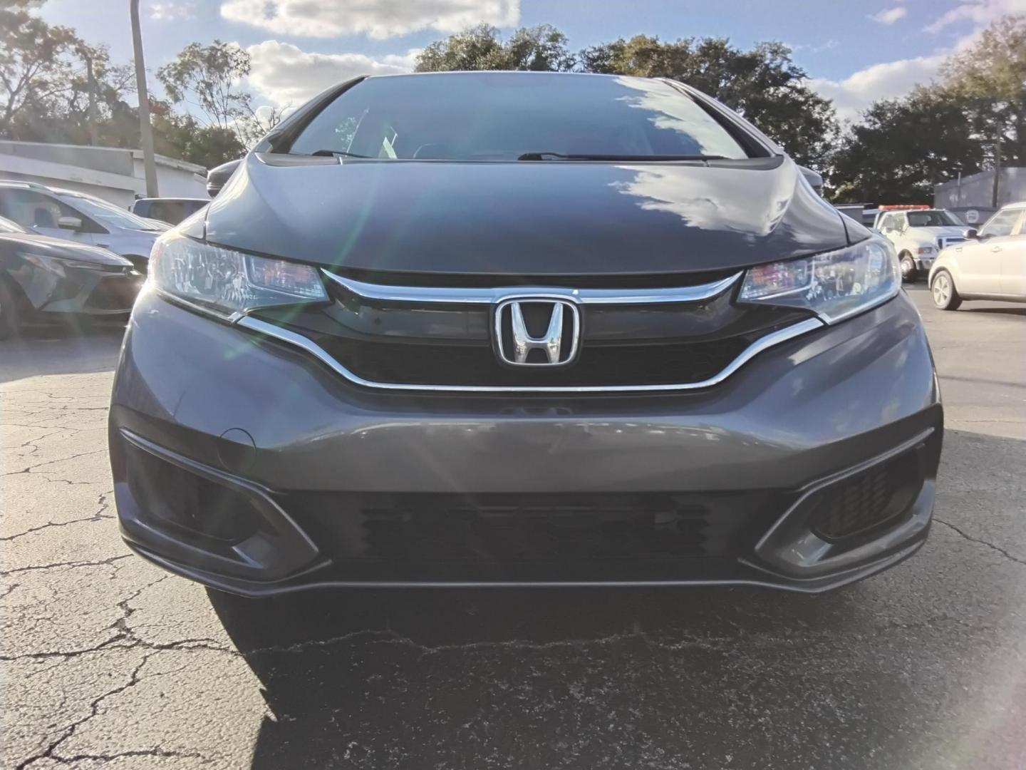 2019 GRAY /Grey Honda Fit LX CVT (3HGGK5H42KM) with an 1.5L L4 SOHC 16V engine, CVT transmission, located at 6112 N Florida Avenue, Tampa, FL, 33604, (888) 521-5131, 27.954929, -82.459534 - $499 DOWN PLUS TAX & TAG. - Photo#1