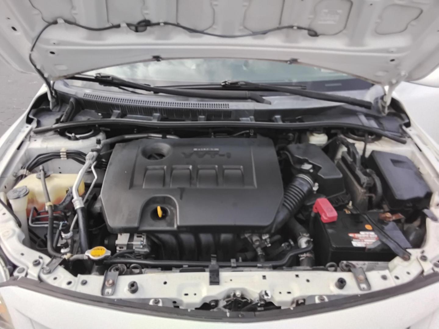 2013 White /Beige Toyota Corolla LE 4-Speed AT (5YFBU4EE0DP) with an 1.8L L4 DOHC 16V engine, 4-Speed Automatic transmission, located at 6112 N Florida Avenue, Tampa, FL, 33604, (888) 521-5131, 27.954929, -82.459534 - $499 DOWN PLUS TAX & TAG. - Photo#10