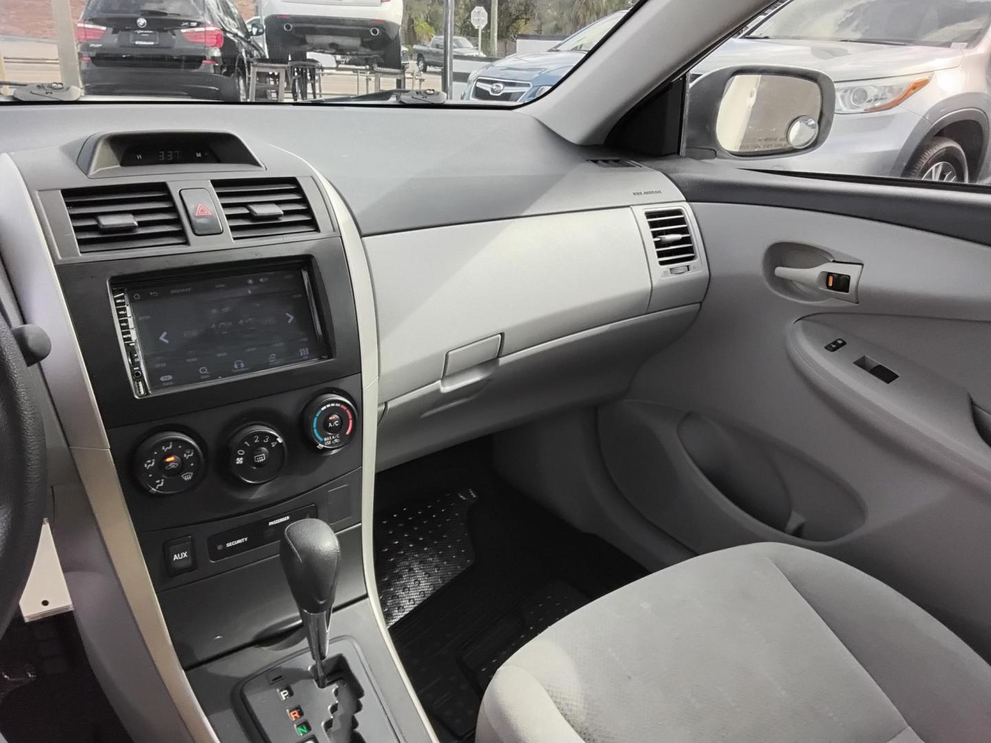 2013 White /Beige Toyota Corolla LE 4-Speed AT (5YFBU4EE0DP) with an 1.8L L4 DOHC 16V engine, 4-Speed Automatic transmission, located at 6112 N Florida Avenue, Tampa, FL, 33604, (888) 521-5131, 27.954929, -82.459534 - $499 DOWN PLUS TAX & TAG. - Photo#6