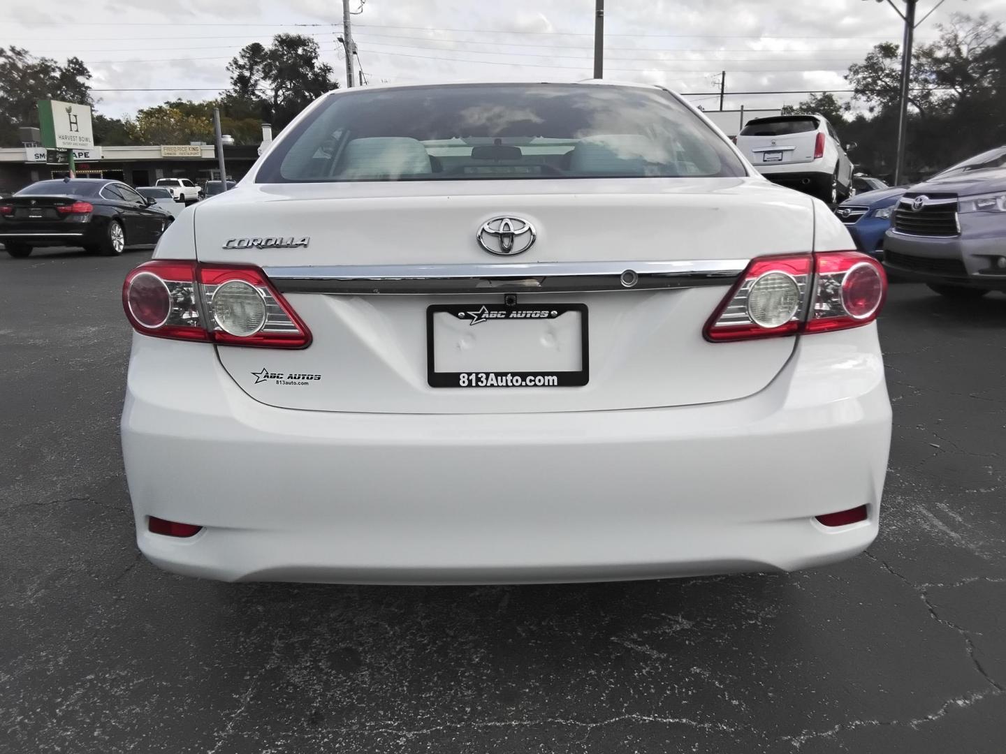 2013 White /Beige Toyota Corolla LE 4-Speed AT (5YFBU4EE0DP) with an 1.8L L4 DOHC 16V engine, 4-Speed Automatic transmission, located at 6112 N Florida Avenue, Tampa, FL, 33604, (888) 521-5131, 27.954929, -82.459534 - $499 DOWN PLUS TAX & TAG. - Photo#4