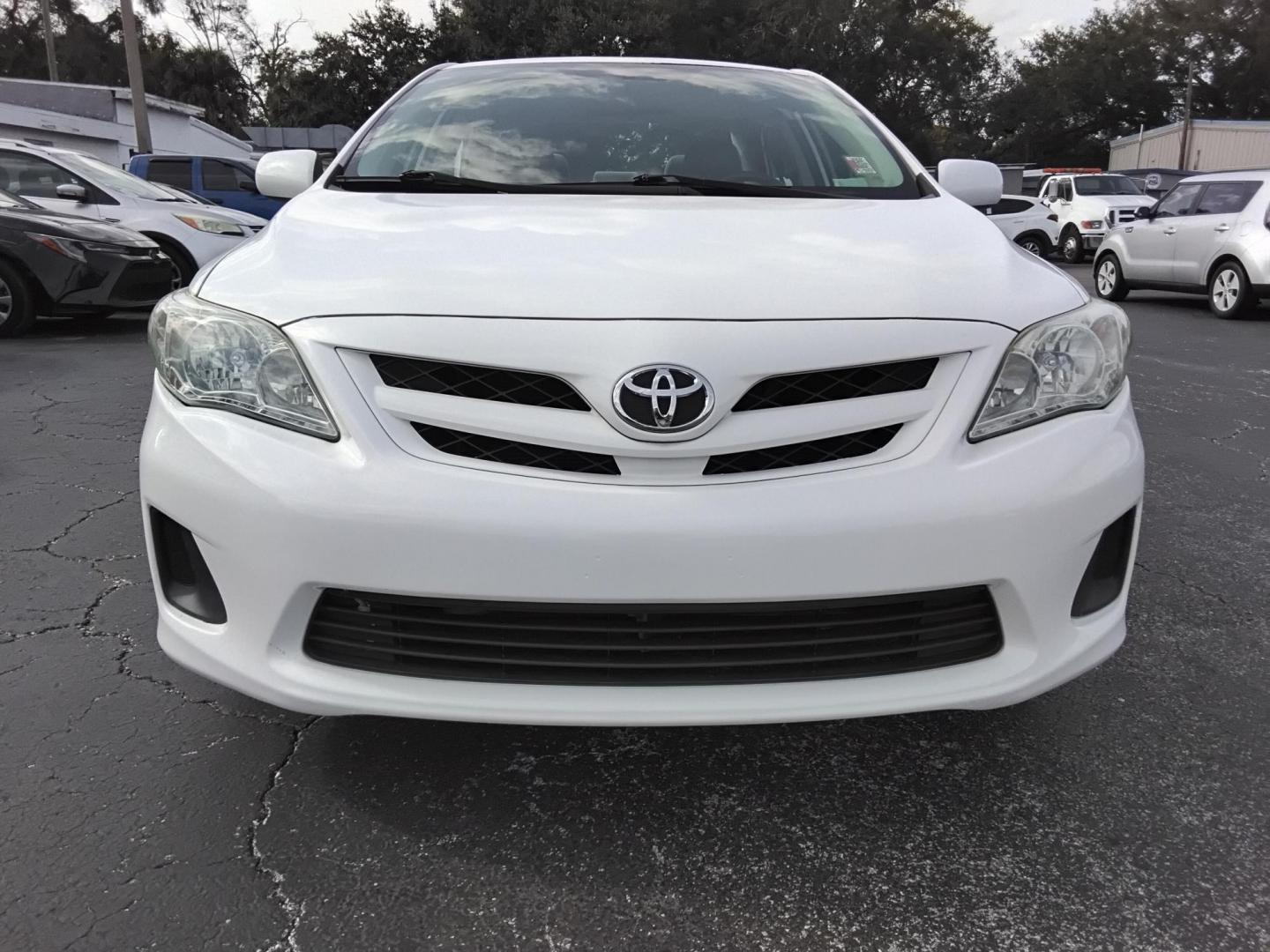 2013 White /Beige Toyota Corolla LE 4-Speed AT (5YFBU4EE0DP) with an 1.8L L4 DOHC 16V engine, 4-Speed Automatic transmission, located at 6112 N Florida Avenue, Tampa, FL, 33604, (888) 521-5131, 27.954929, -82.459534 - $499 DOWN PLUS TAX & TAG. - Photo#1