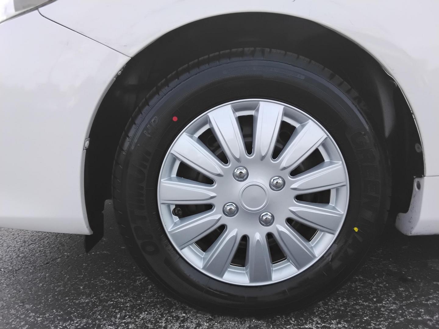 2013 White /Beige Toyota Corolla LE 4-Speed AT (5YFBU4EE0DP) with an 1.8L L4 DOHC 16V engine, 4-Speed Automatic transmission, located at 6112 N Florida Avenue, Tampa, FL, 33604, (888) 521-5131, 27.954929, -82.459534 - $499 DOWN PLUS TAX & TAG. - Photo#9