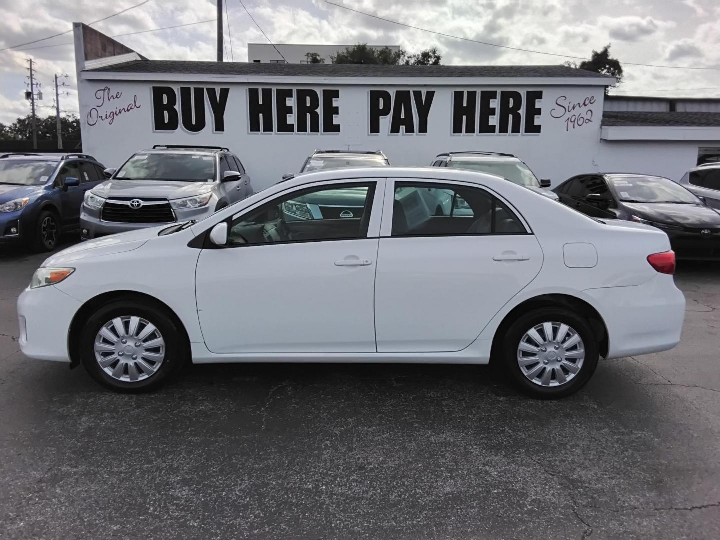 2013 White /Beige Toyota Corolla LE 4-Speed AT (5YFBU4EE0DP) with an 1.8L L4 DOHC 16V engine, 4-Speed Automatic transmission, located at 6112 N Florida Avenue, Tampa, FL, 33604, (888) 521-5131, 27.954929, -82.459534 - $499 DOWN PLUS TAX & TAG. - Photo#0